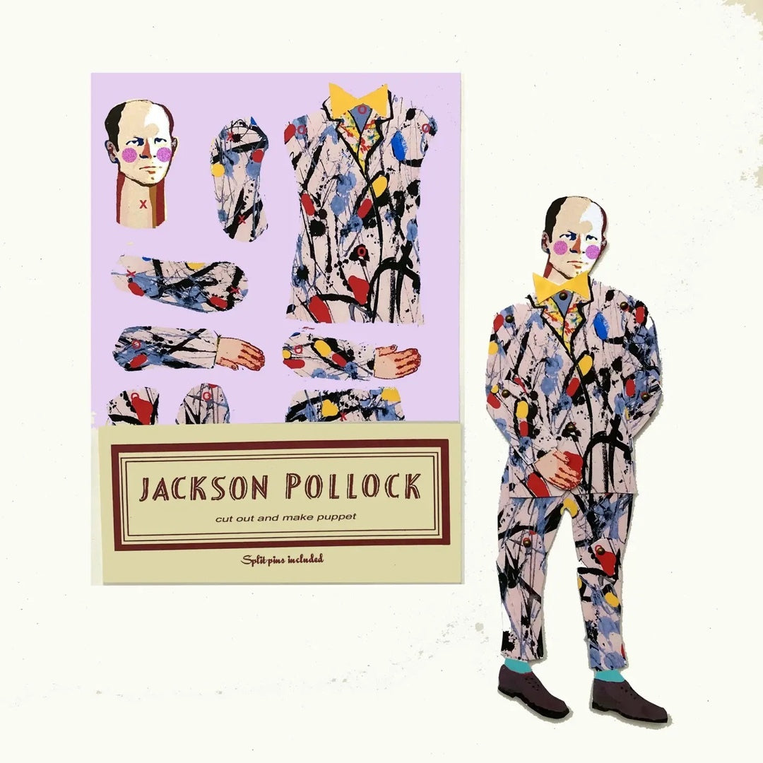 A paper puppet of Jackson Pollock in a white suit with multicolored abstract design, including yellow, red, blue, and black, and a yellow bow tie, with packaging.