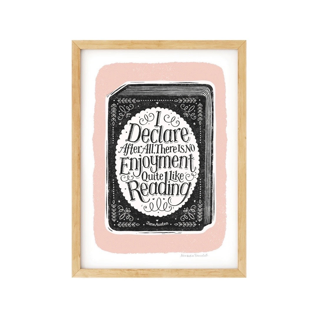 A print with a big black book on a pink background and the text 'I declare after all there is no enjoyment quite like reading' written in black text inside a white oval on the cover