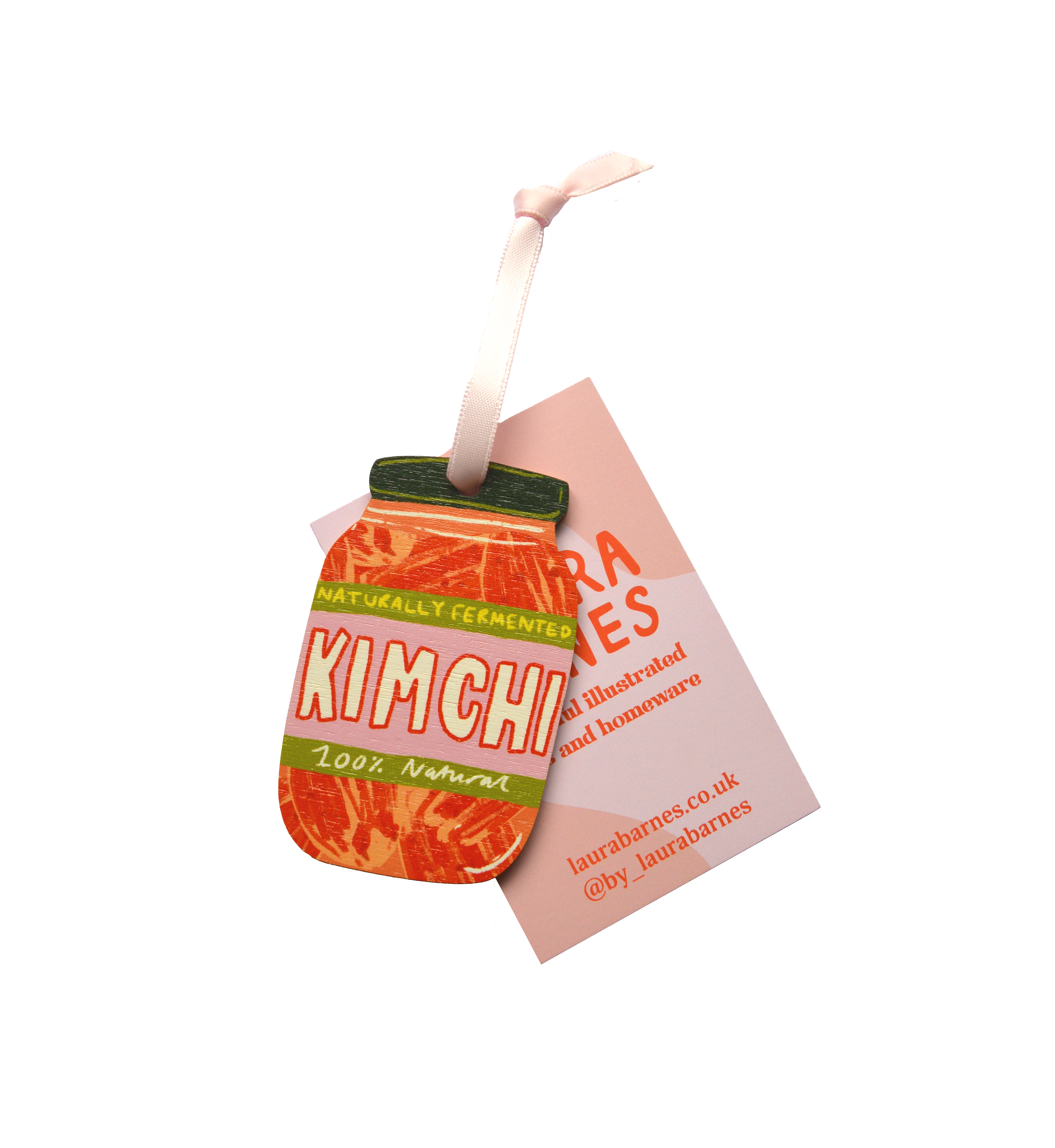 Kimchi jar-shaped ornament with a label on a white background.