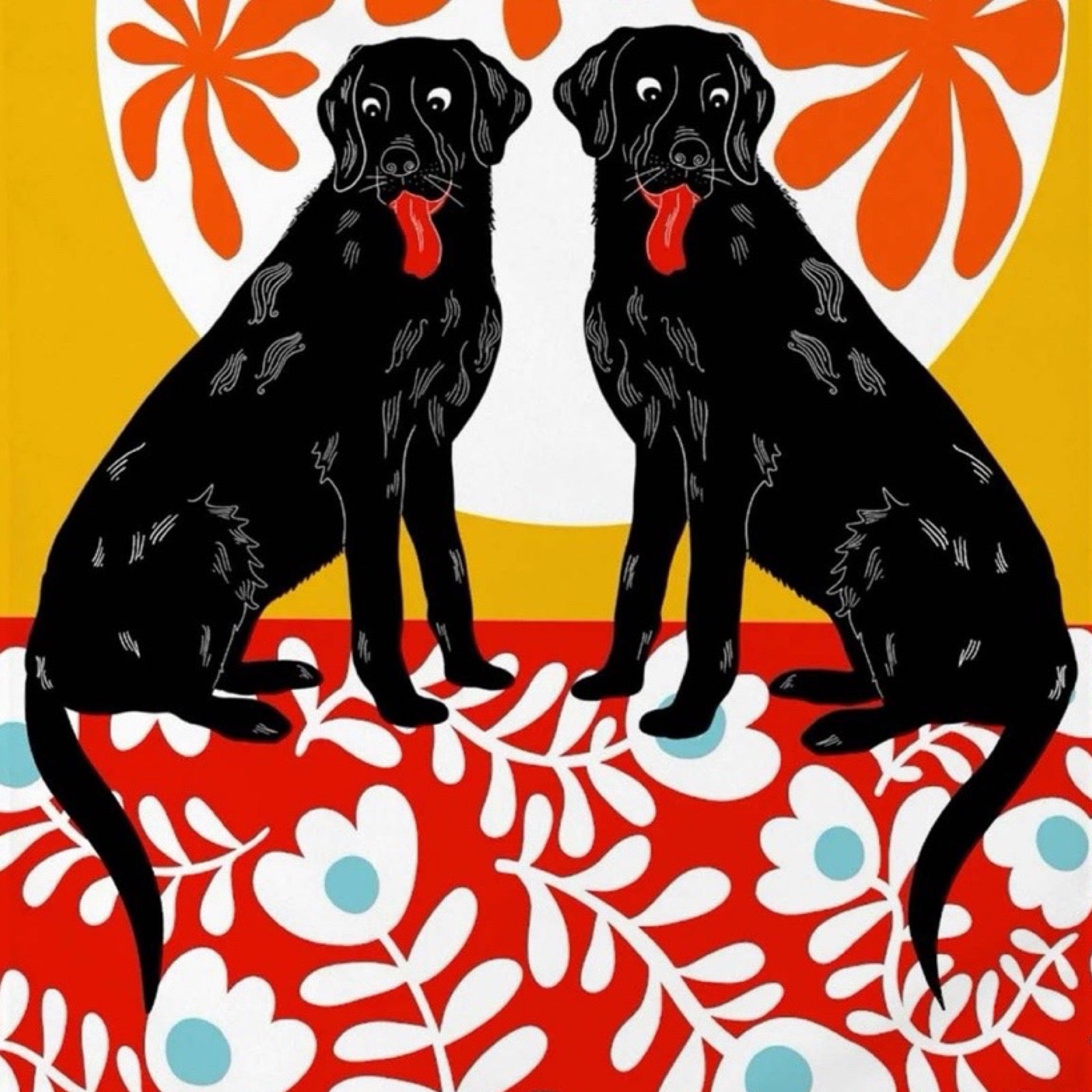 Tea towel of two black labrador dogs sitting on a red floral blanket under the moon.
