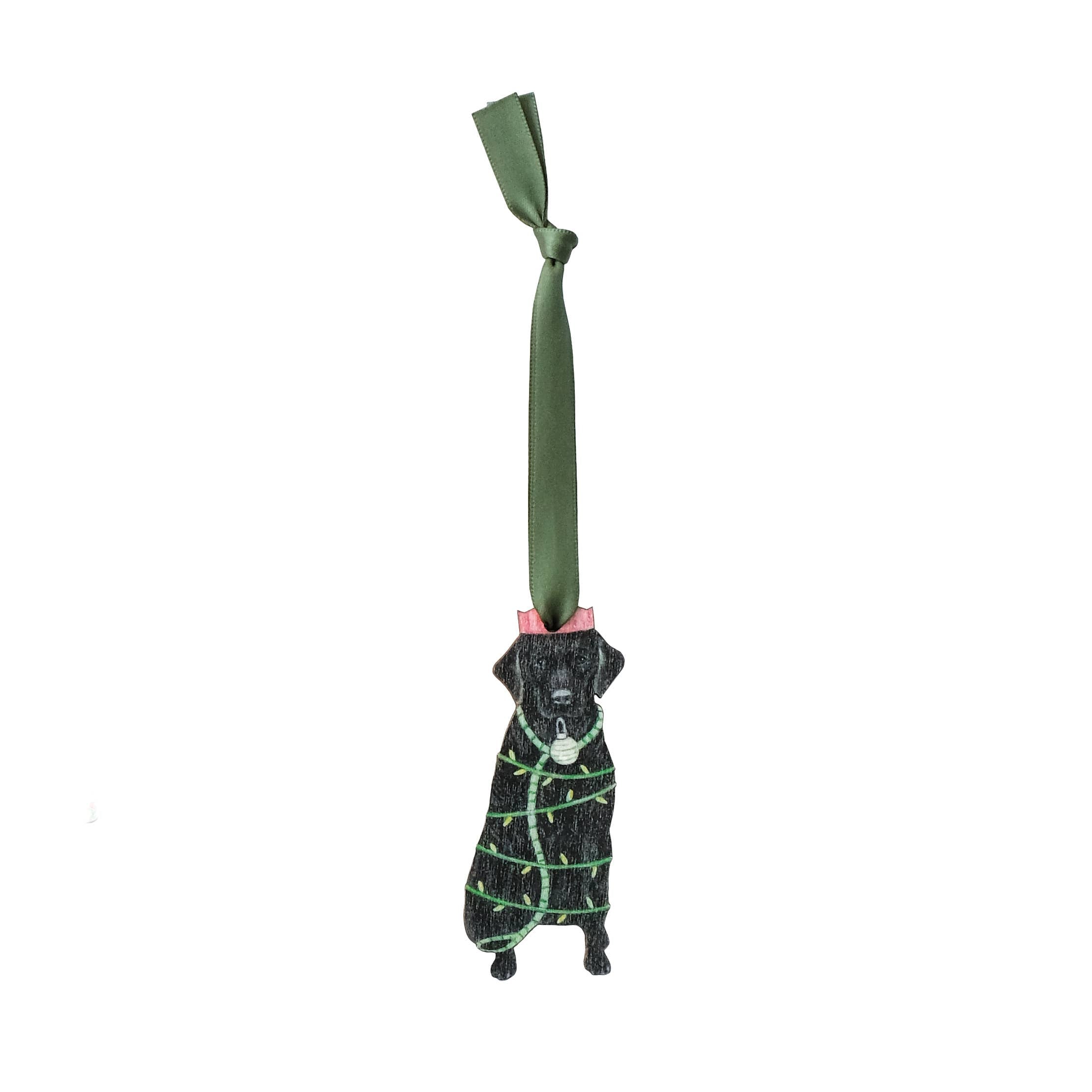 Wooden Christmas decoration of a black labrador wrapped in Christmas lights. 