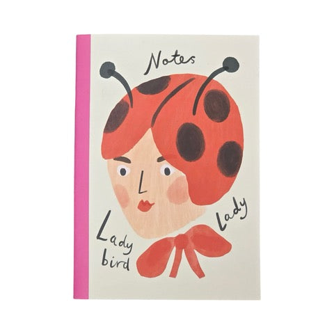 These gorgeous notebooks feature a lady's head wearing a ladybird hat and a large red bow around her neck. 