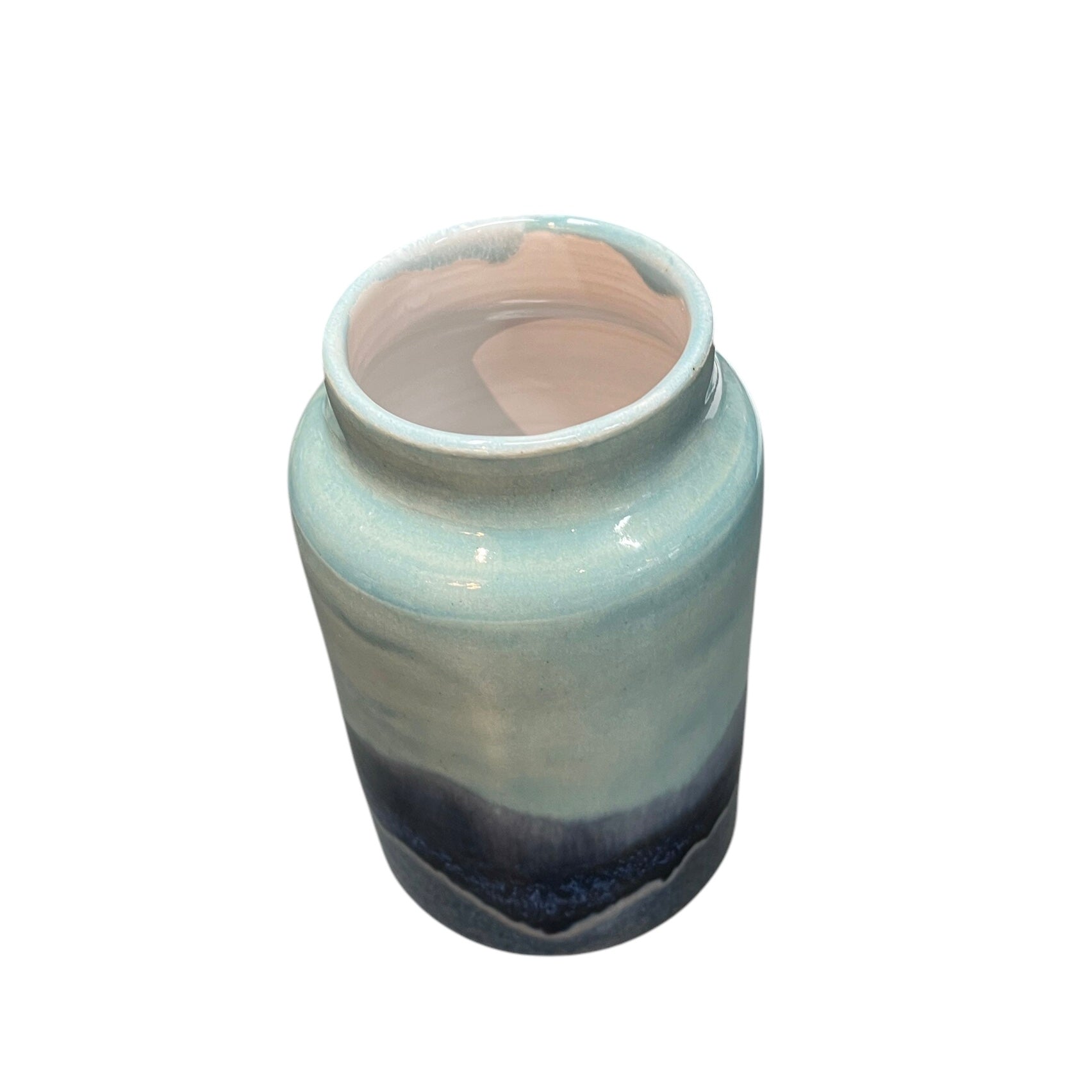 Colourful landscape vases are the perfect size for your favourite bunch of flowers. Each handmade vase is a piece of art inspired by the Scottish landscape. They are handmade on a potter's wheel so no two will be identical. These vases are available in blue or pink.