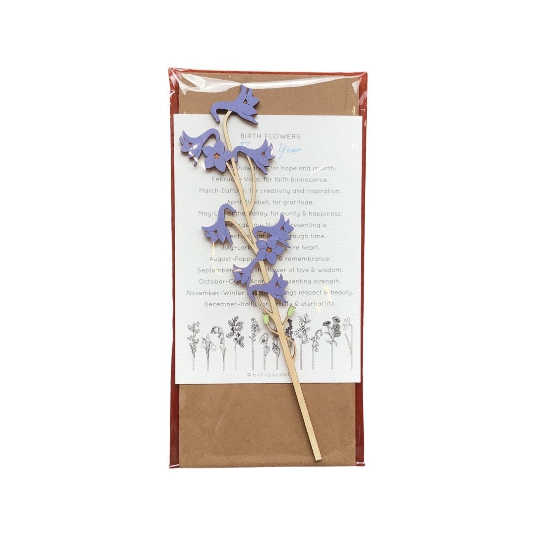 Packaged single larkspur flower wooden stem with blue flowers