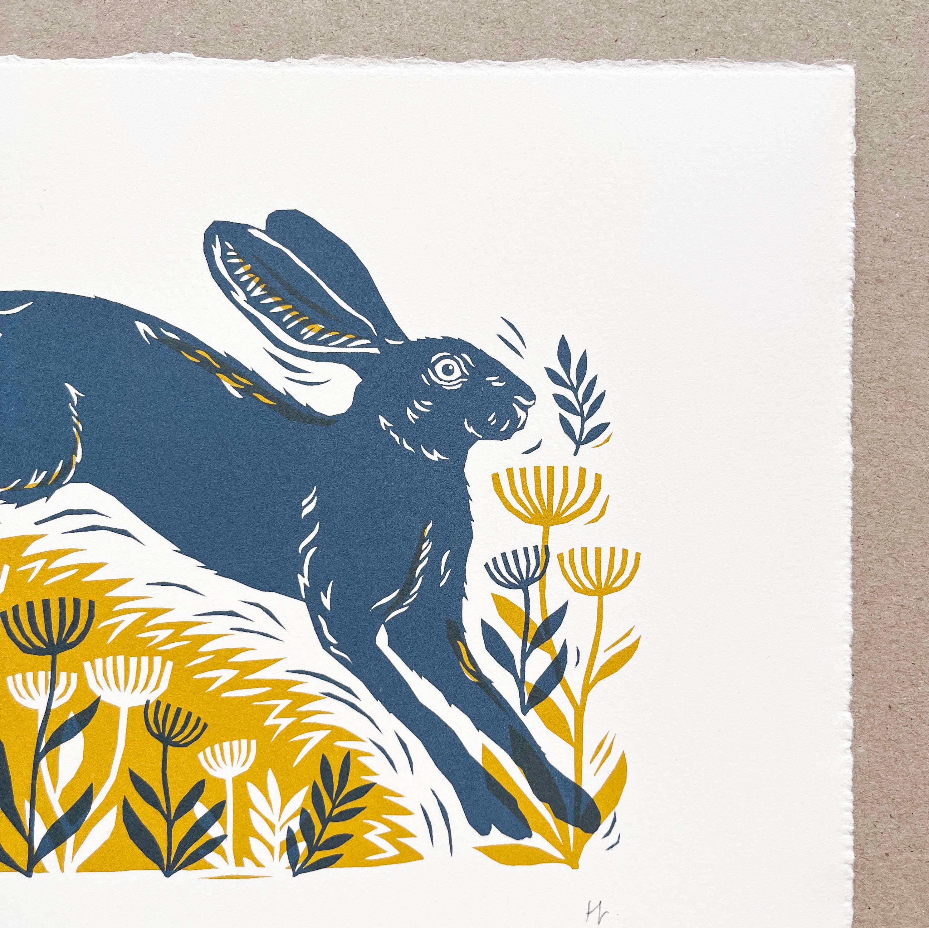 Blue hare with yellow flowers on a white background.