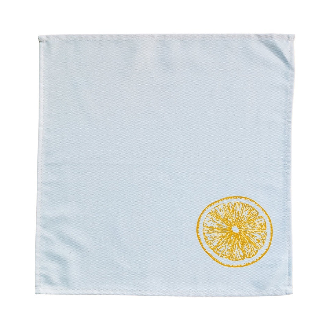 Rolled cotton napkin featuring a yellow lemon slice.