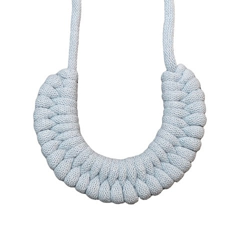 A hand-knotted style necklace made by hand from 100% recycled light blue cotton cord with a magnetic metal fastening. 