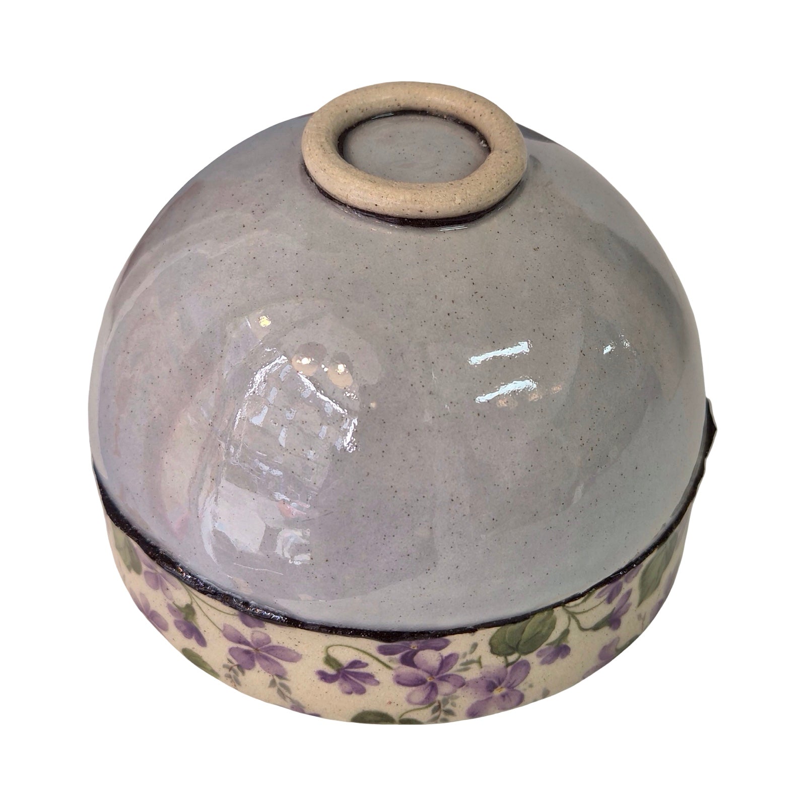 Ceramic bowl with floral pattern on a white background.