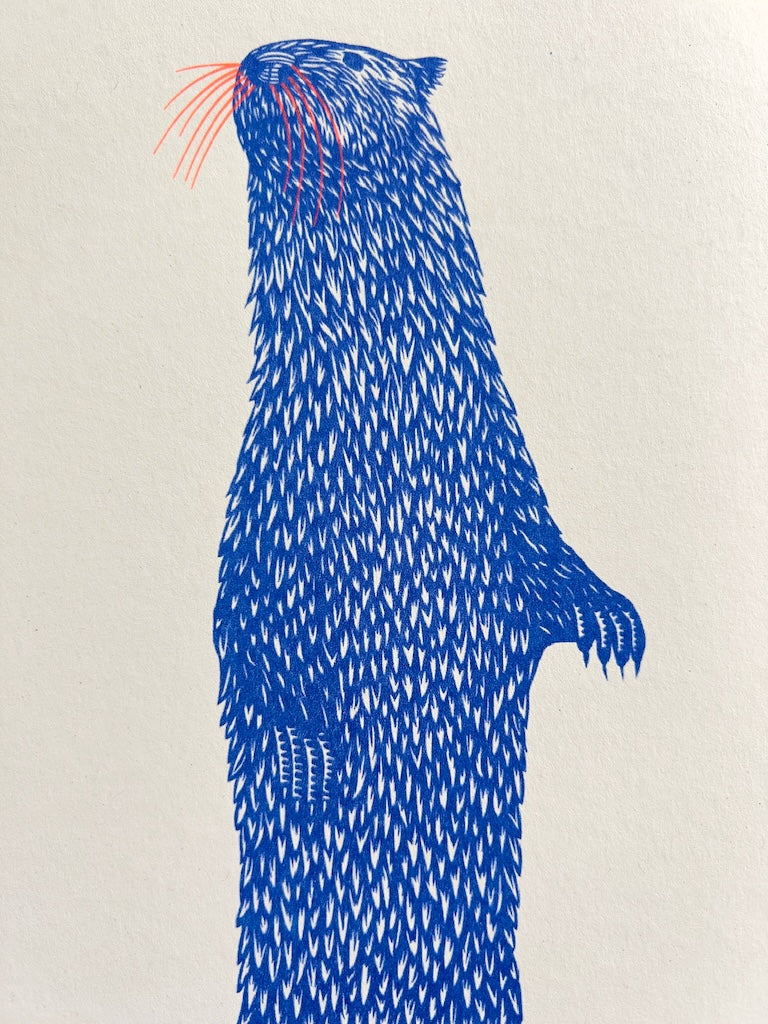 This risograph print features a blue standing otter. 