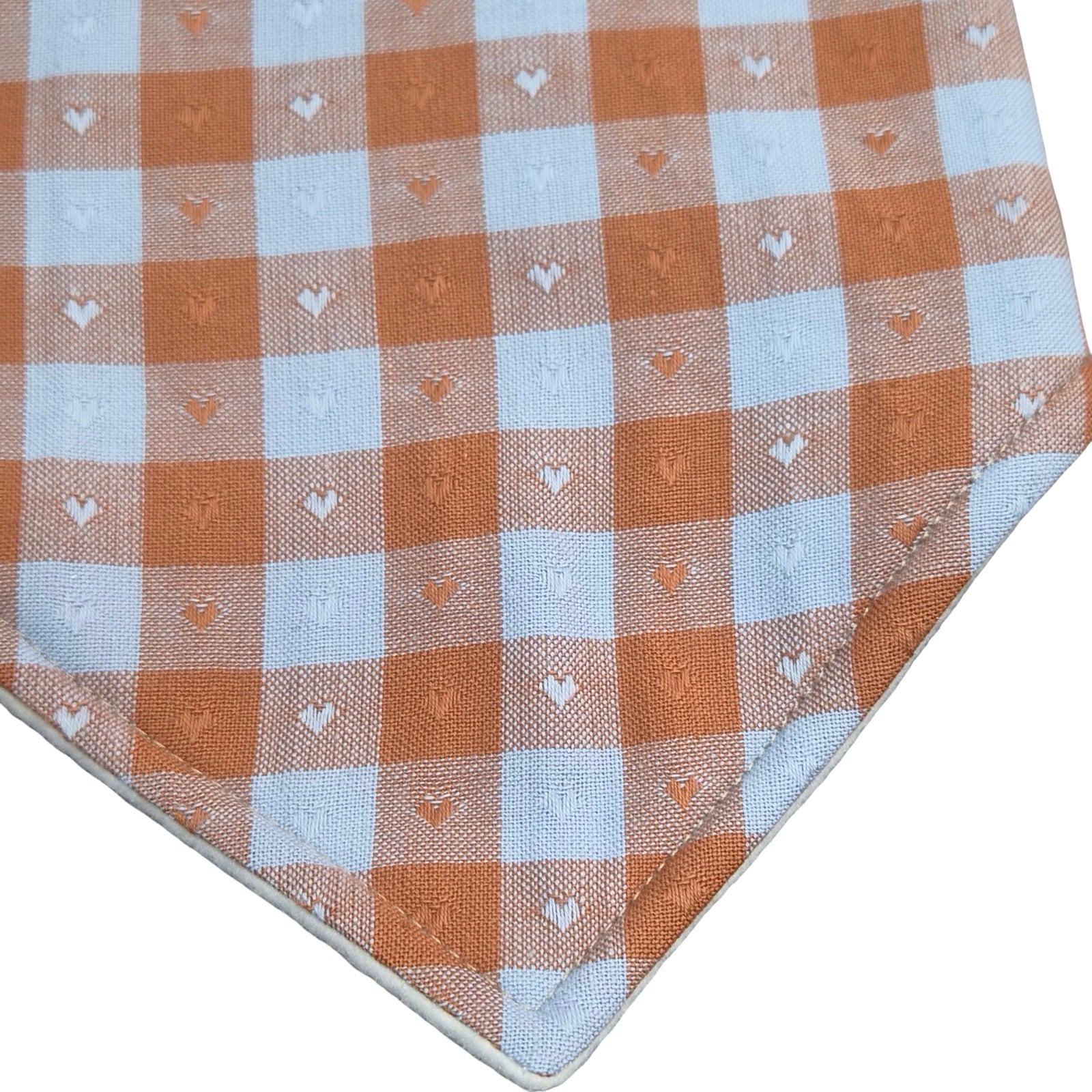 Close up of gingham bib.
