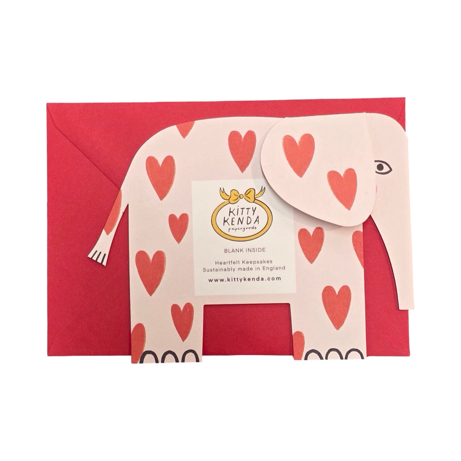 Card with elephant design and heart patterns on a red envelope, featuring Kitty Kenda branding.