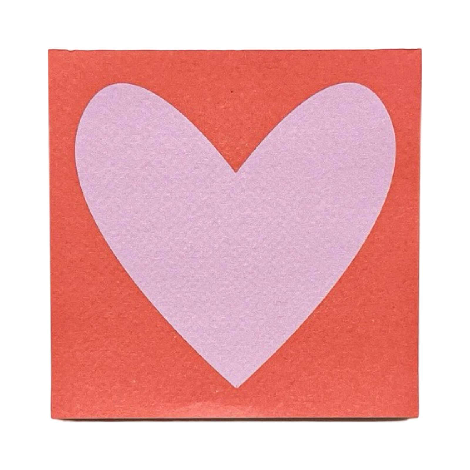 Square notepad with a pink heart on a red background.