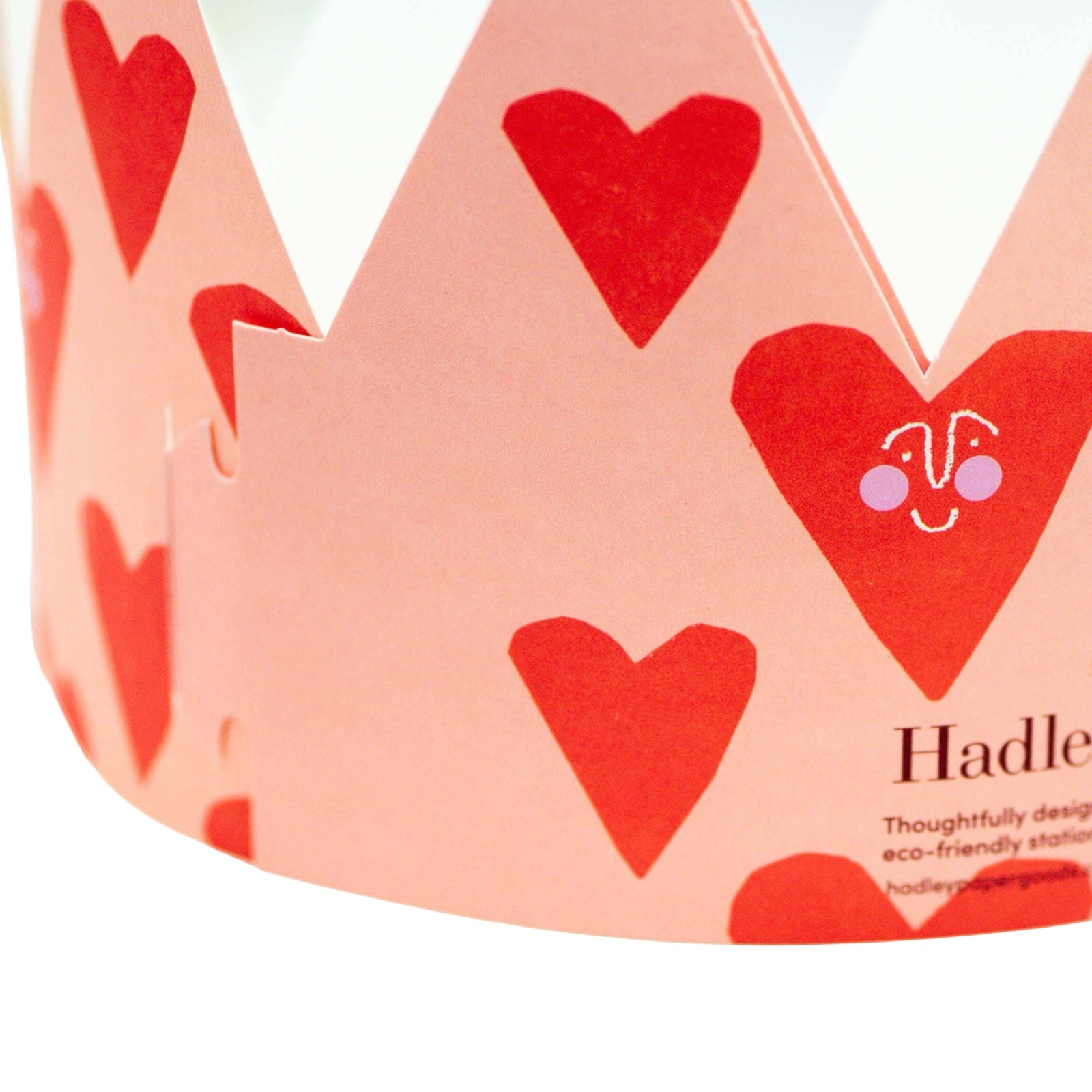 A gorgeous pink crown-shaped card with red love hearts and the text 'Loved'. 