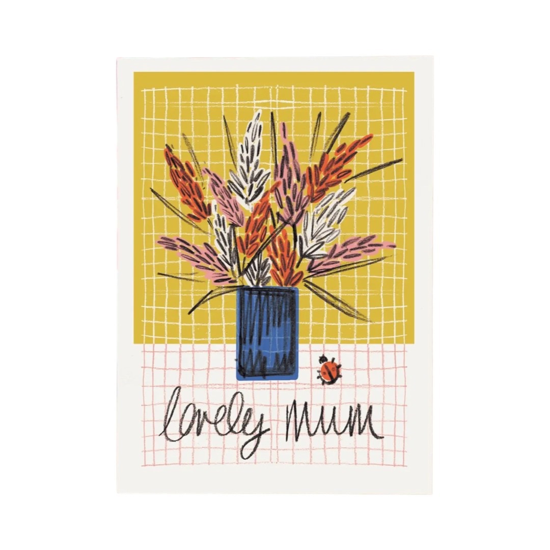 Mother's Day card featuring an illustration of a blue vase with pink, orange and white wildflowers against a yellow and white background