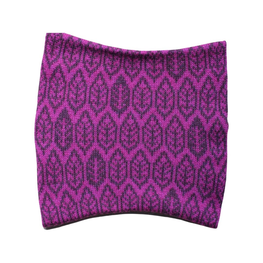 A super soft and cosy 100% lambswool knitted snood in a magenta and purple leaf design.