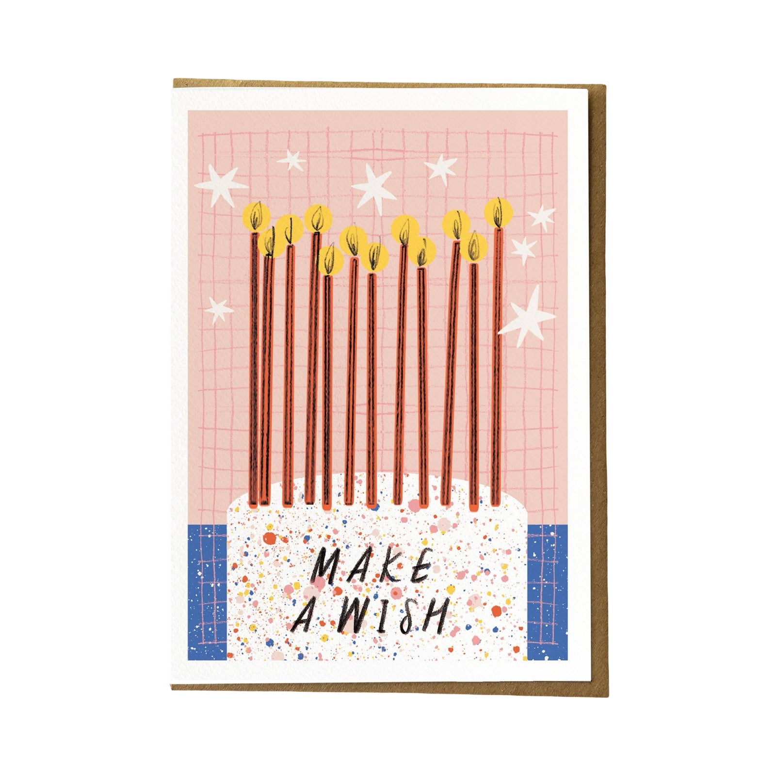 Greeting card with lit candles and 'Make a Wish' text, with a brown envelope on a white background.
