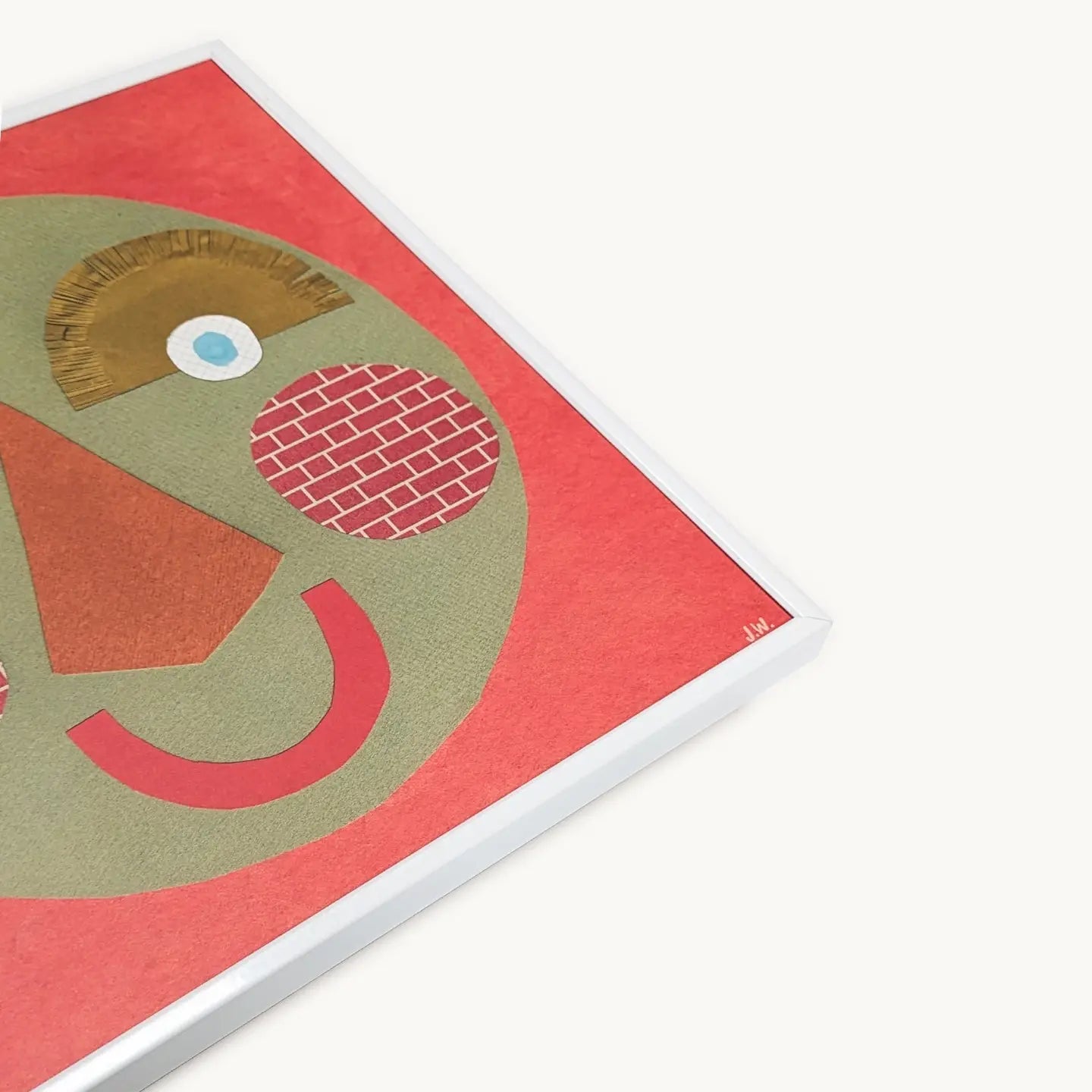 Collage with a stylised face design on a pink background.
