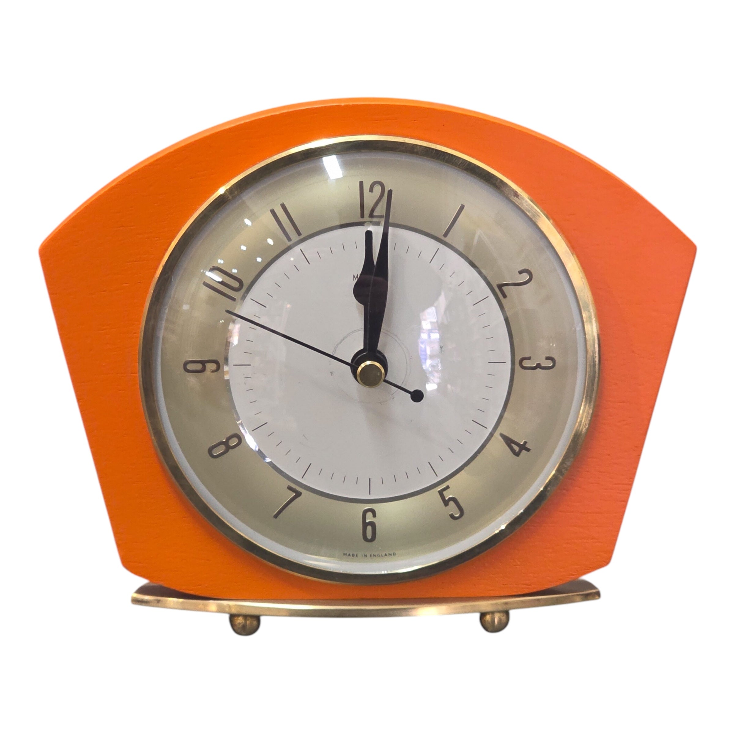 An image of an orange clock 
