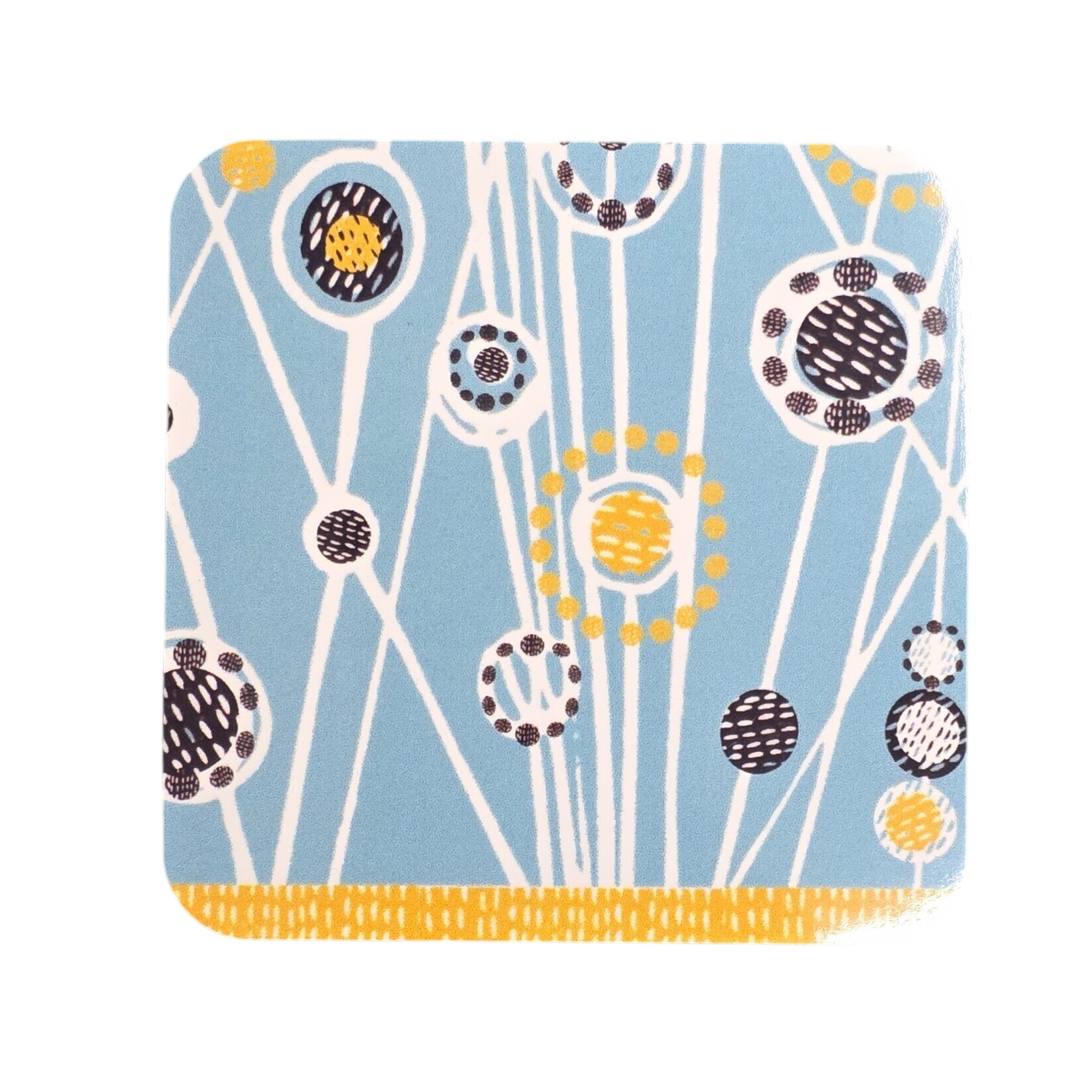 An image of a coaster with a blue background and an abstract design. 