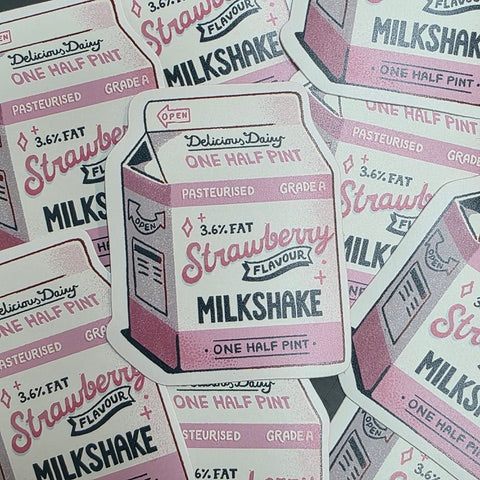 Sticker featuring a retro carton of strawberry milkshake.