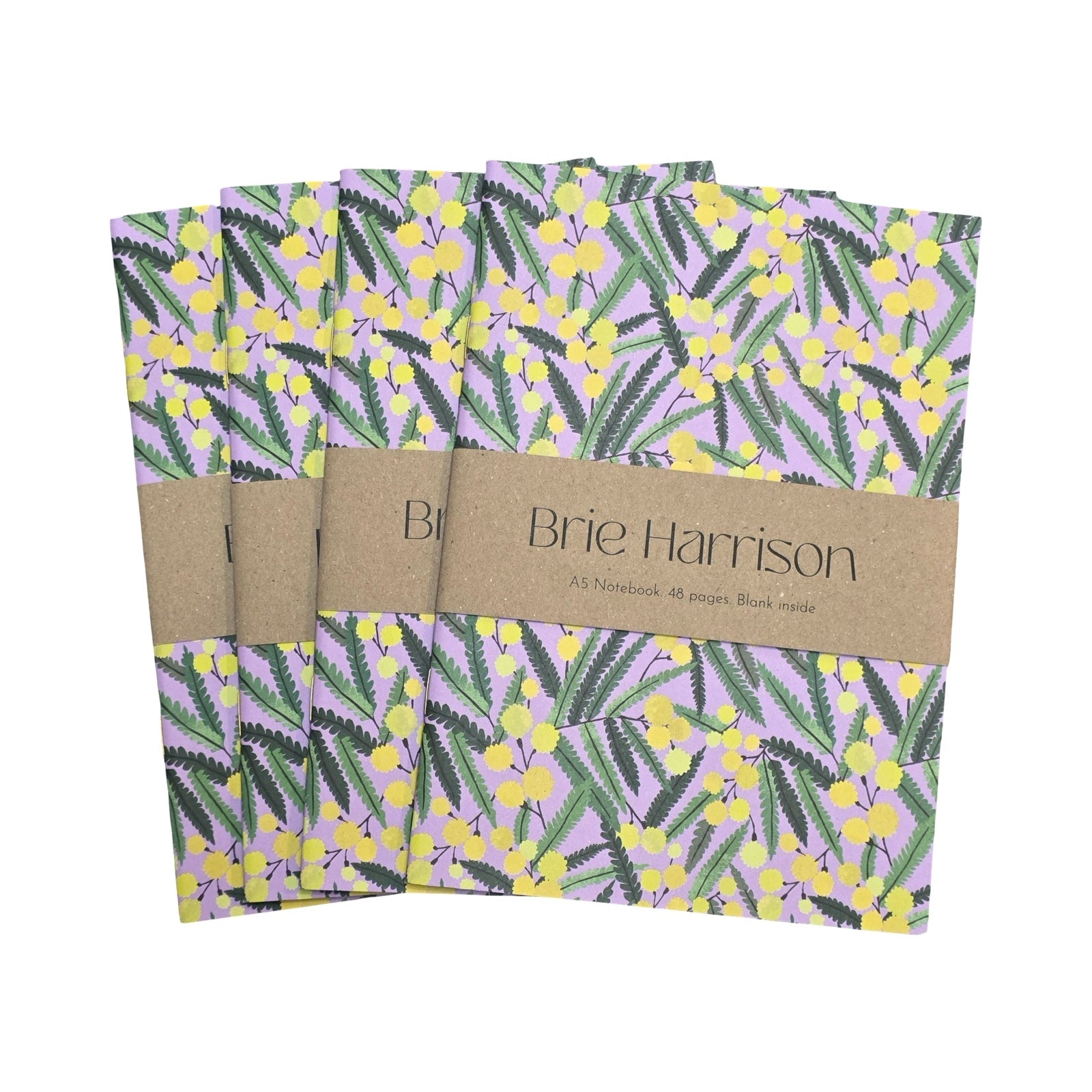Set of notebooks with floral pattern and Brie Harrison branding on a white background.
