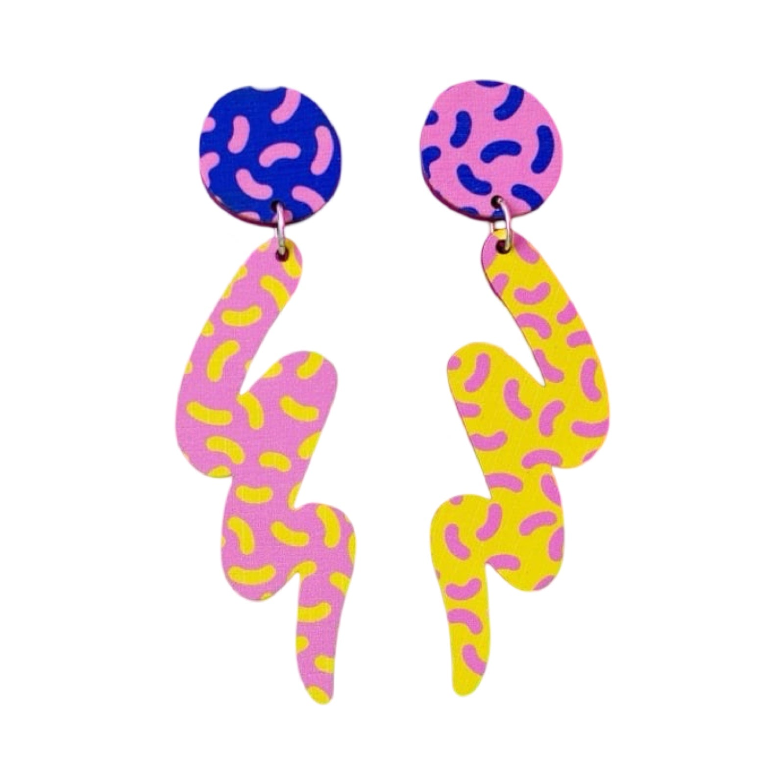 These wooden mismatched earrings feature one earring with a blue and pink dashed circular stud with a large pink and yellow dashed squiggle hanging underneath and one earring with a pink and blue dashed circular stud with a large yellow and pink dashed squiggle hanging underneath