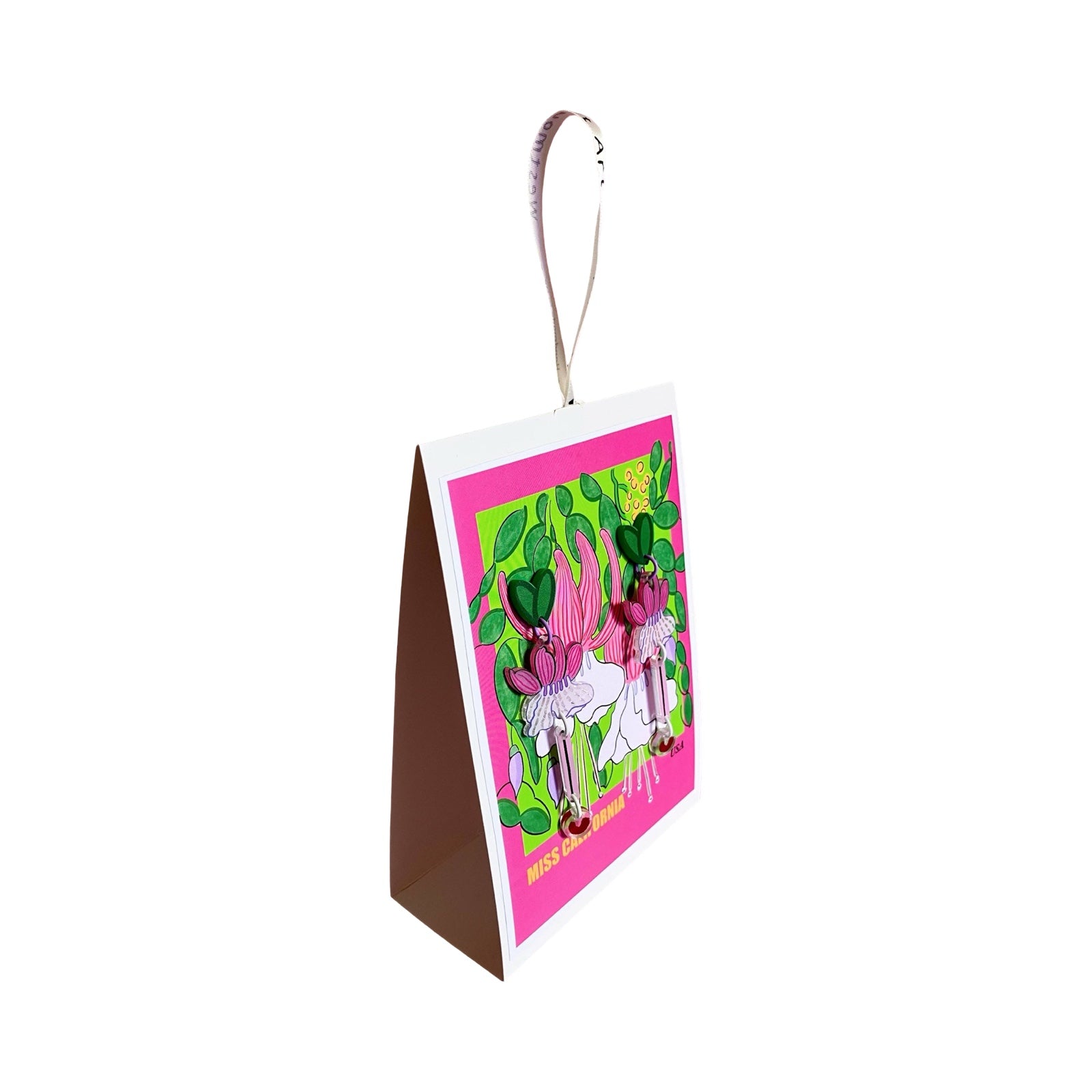 A pair of acrylic dangle earrings with green leaf studs, pink and white fuchsias, long pink stems and red love hearts at the base, all on a matching backing card.