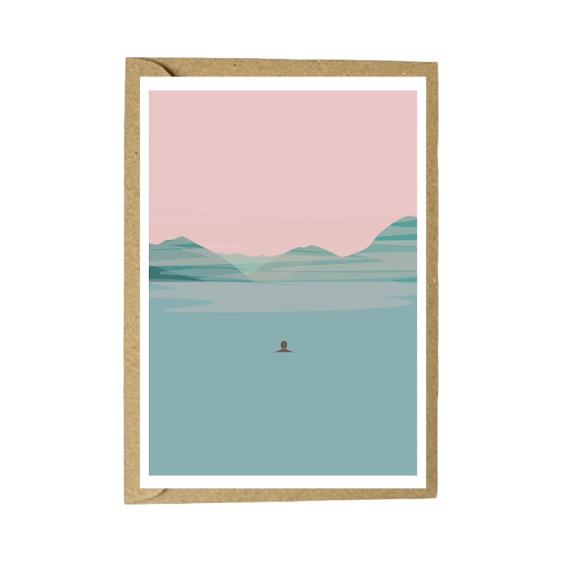 Card featuring mountains and water and a pink sky, on a white background.