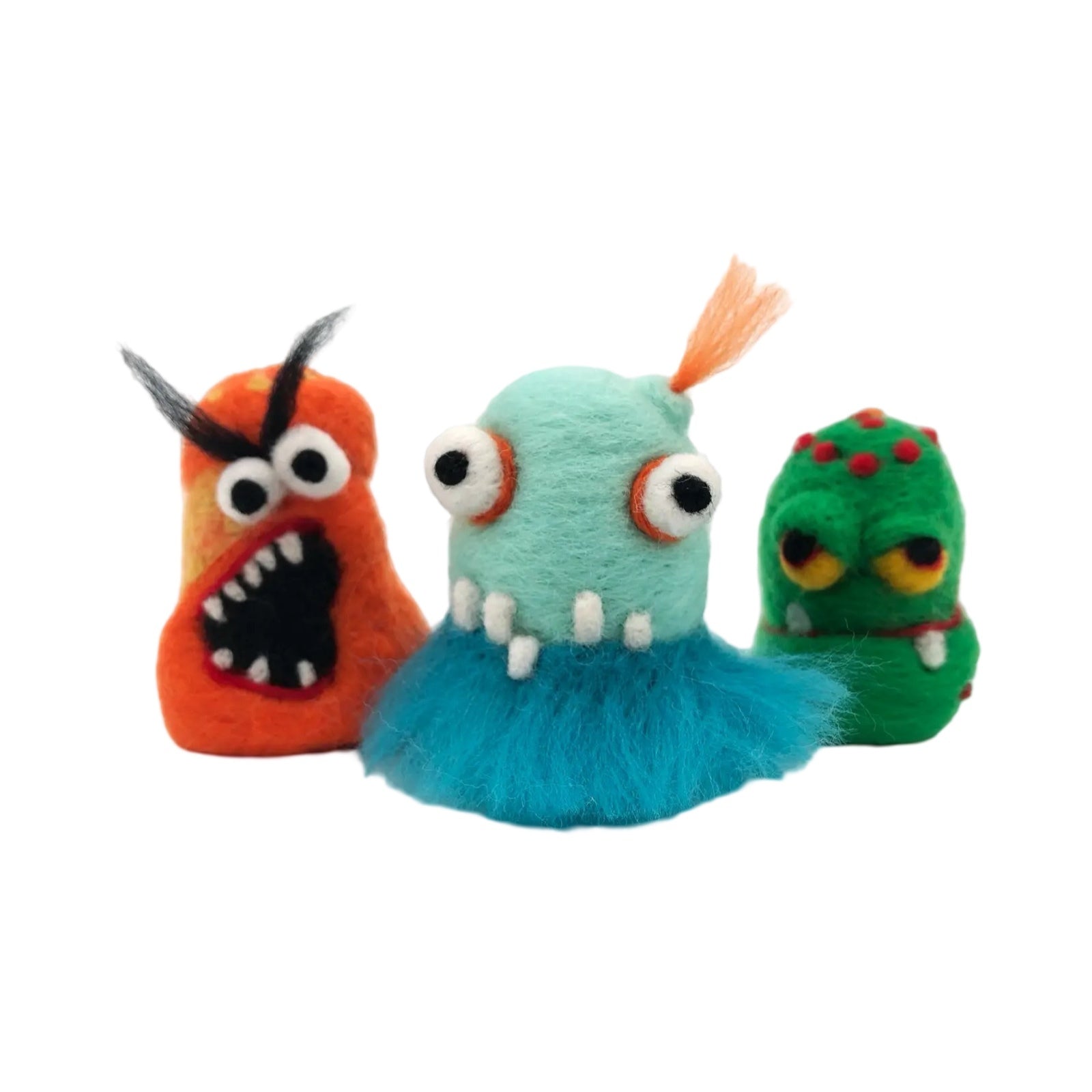 An orange felted monster, a turquoise and blue felted monster and a green felted monster