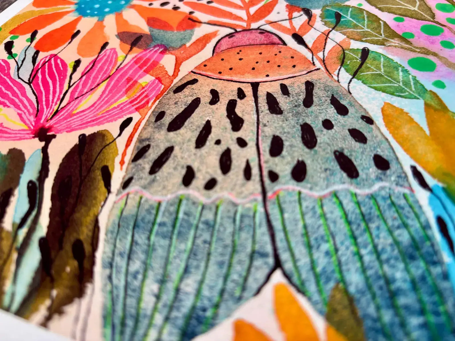Colourful butterfly illustration with floral elements.