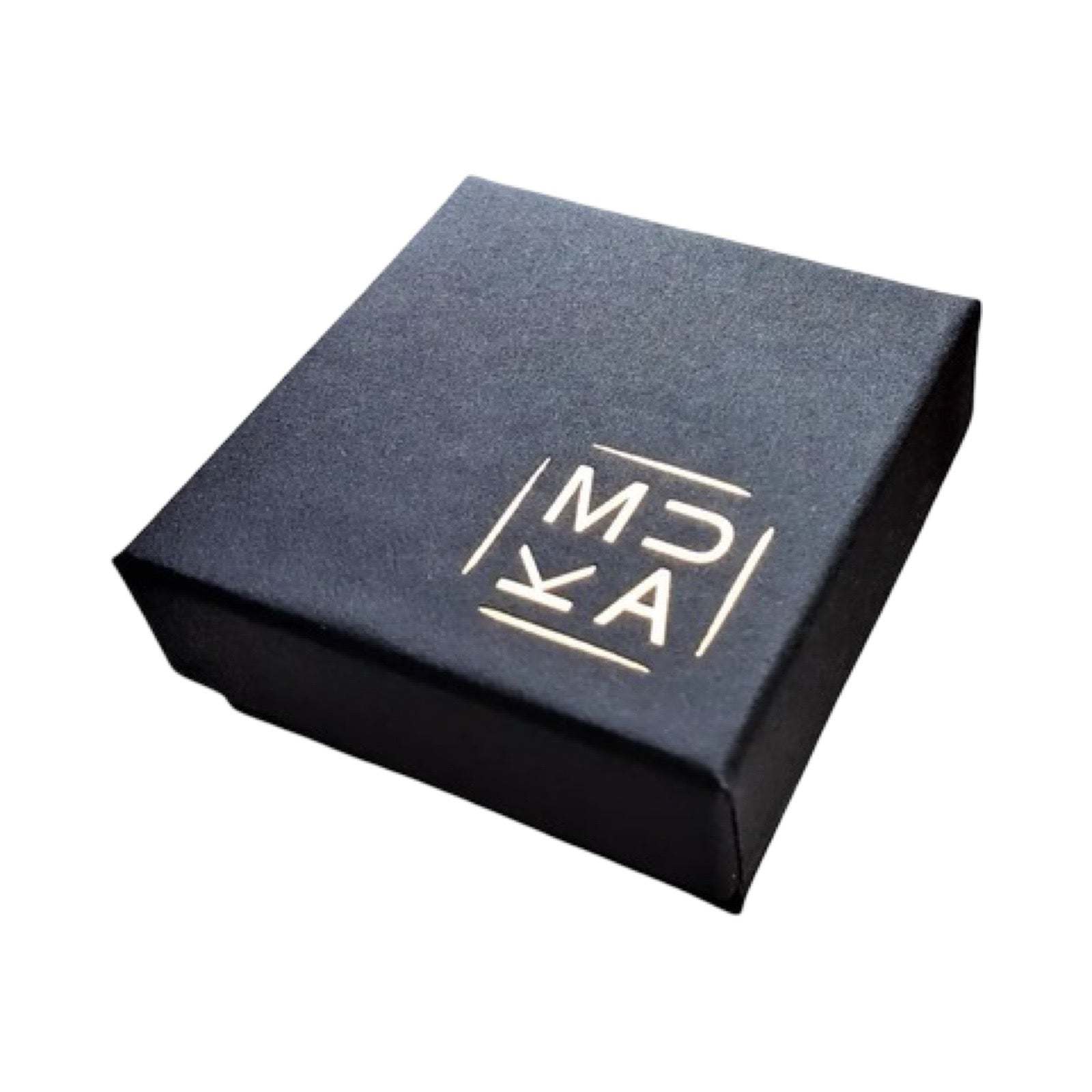 Black MUKA studio branded black box.