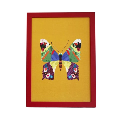 Print of a multicoloured butterfly on a mustard background in a red frame.