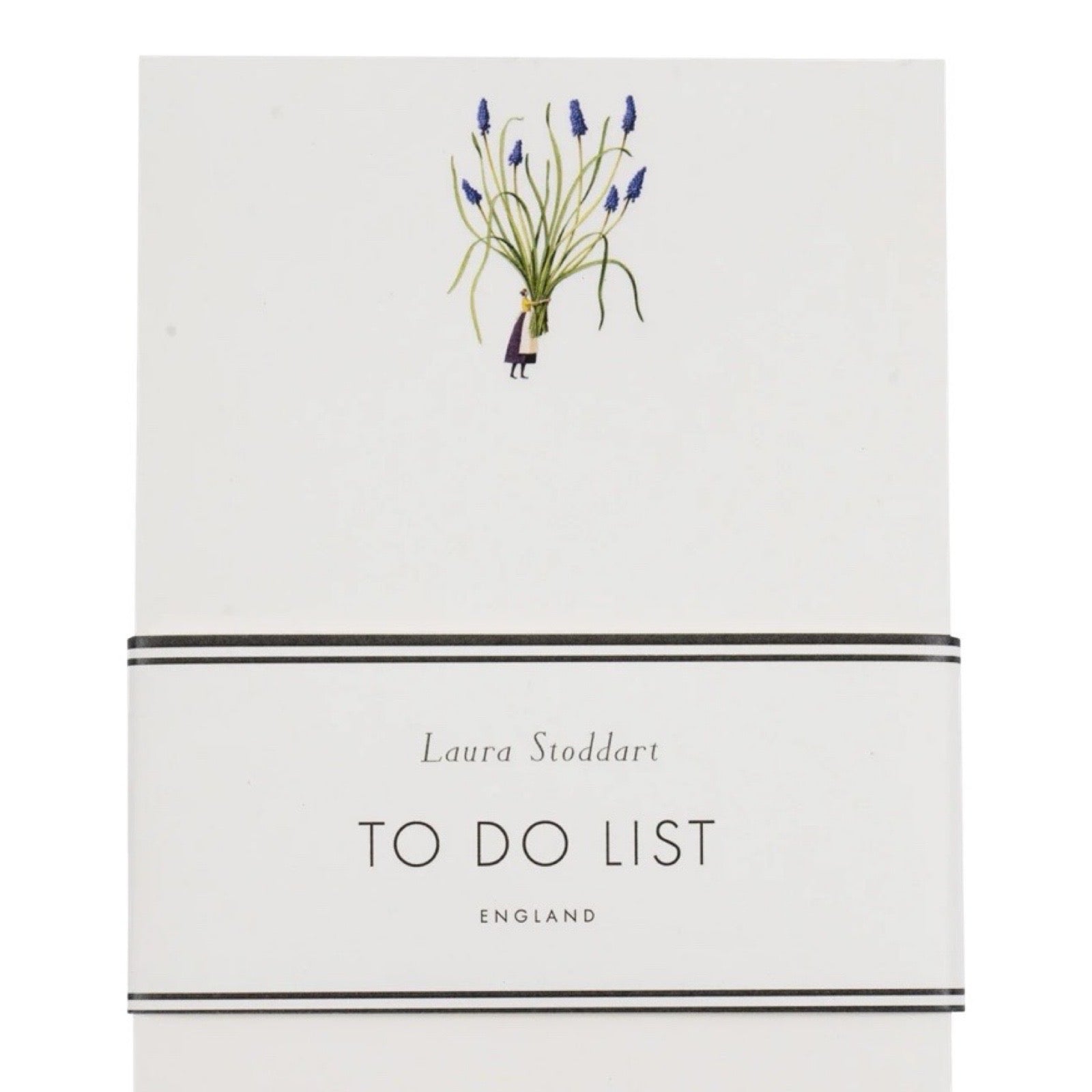 White notebook with floral illustration and 'Laura Stoddart' branding.