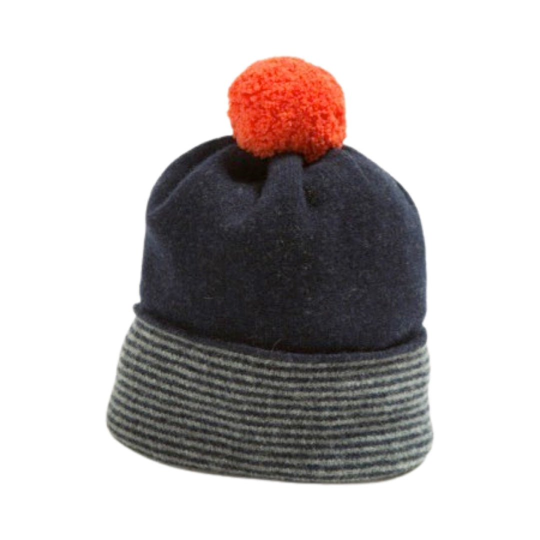 100% navy lambswool pom pom hat.