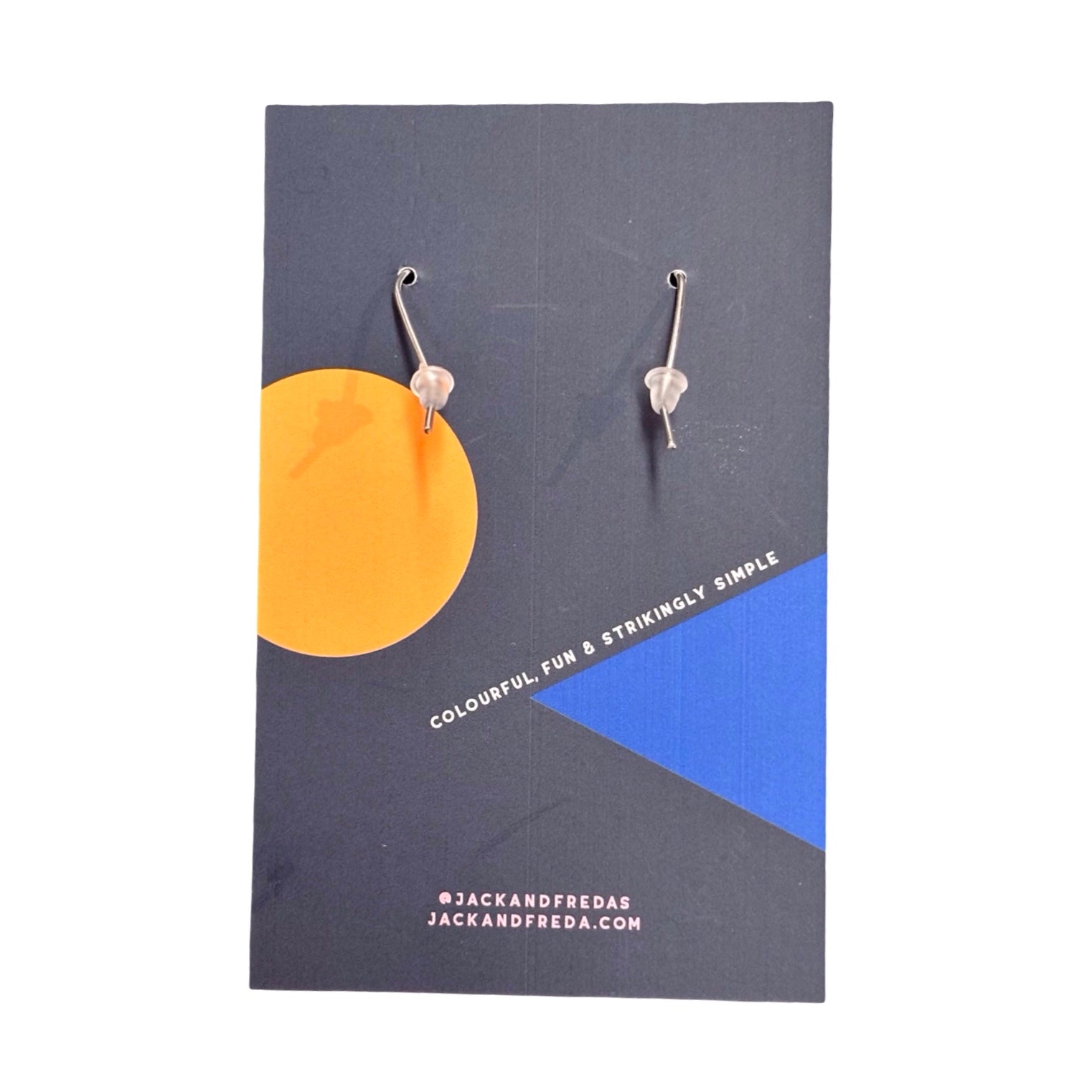 Back of a pair of earrings on a Jack and Freda branded card with geometric design.