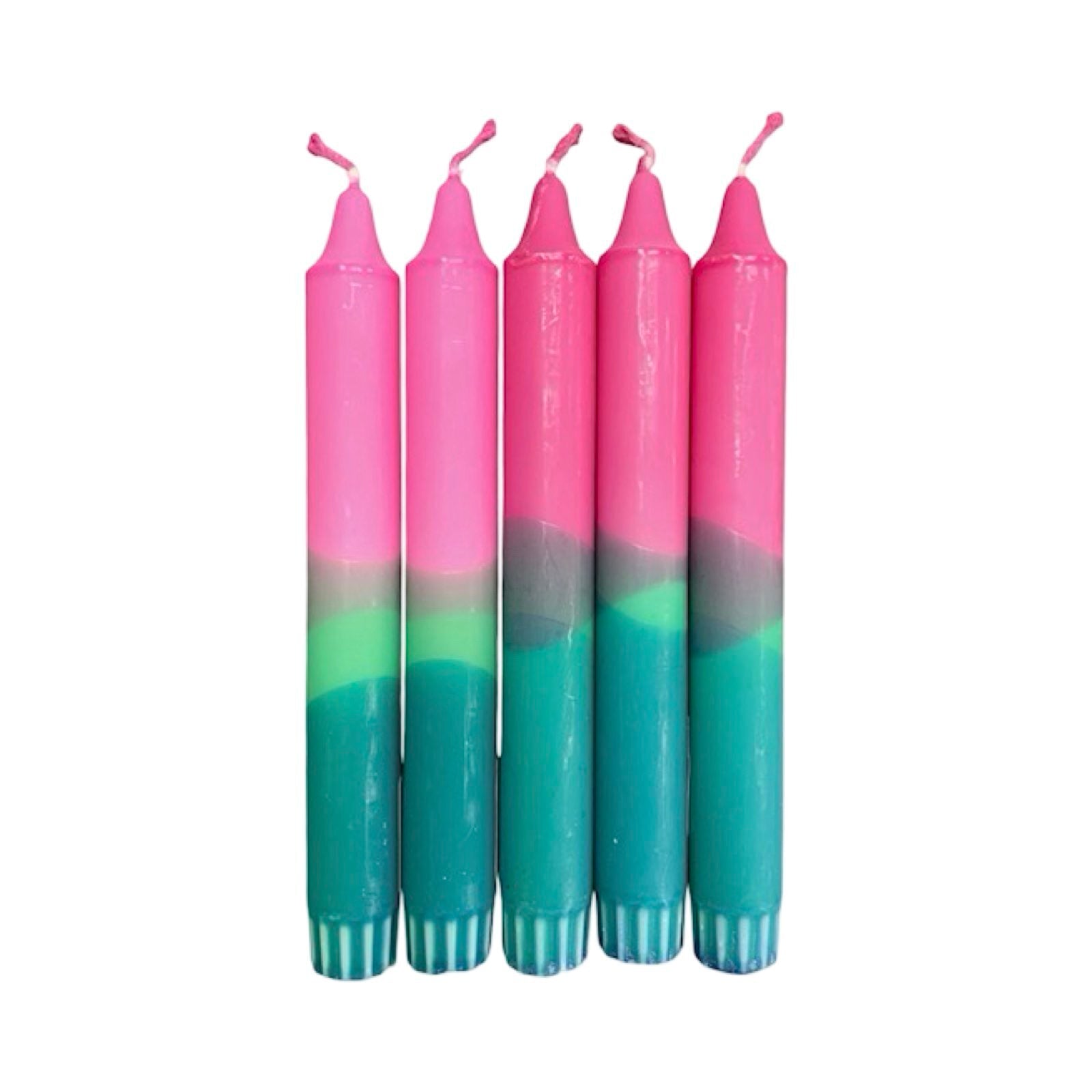 A row of five handmade dinner candles with a green base, a lighter green centre, and a pink top.