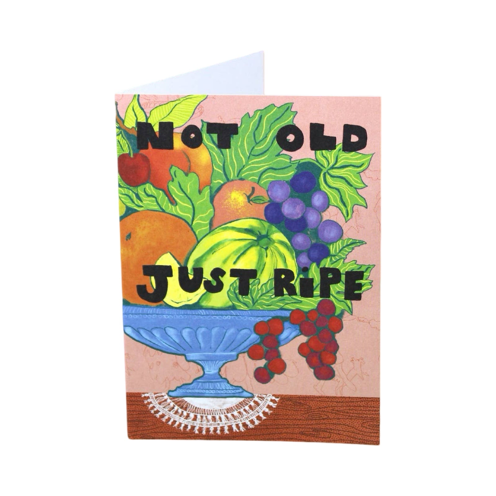 Birthday card featuring a large bowl of colourful fruit with the text 'Not Old Just Ripe'.