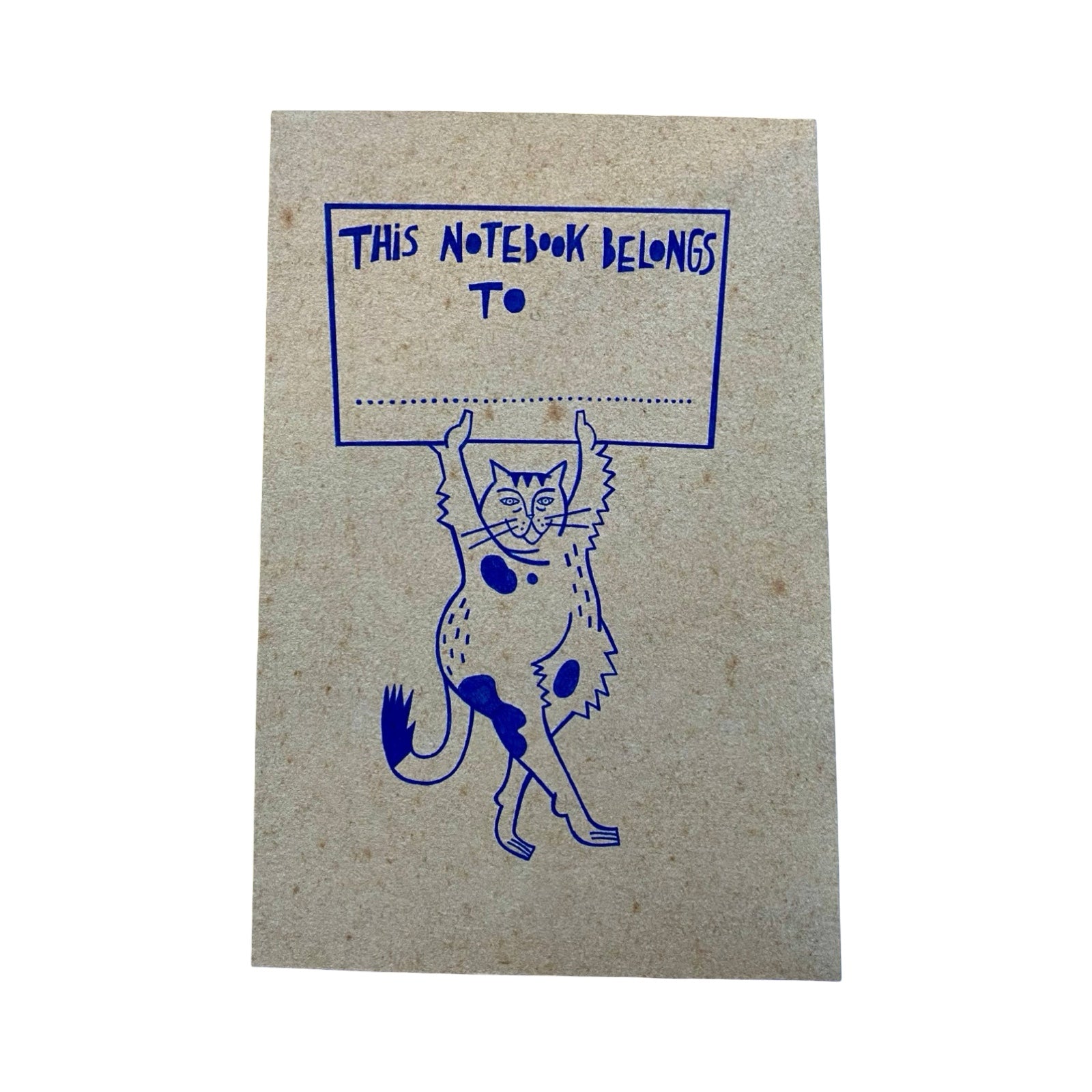 The inside of a paper notebook with a blue hand-drawn illustration of a cat holding a sign that reads 'THIS NOTEBOOK BELONGS TO ___'.