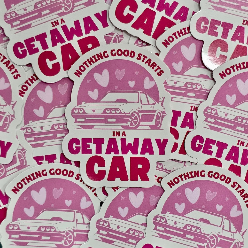 A waterproof vinyl sticker of a retro pink car and the text 'Nothing good starts in a getaway car' in pink.