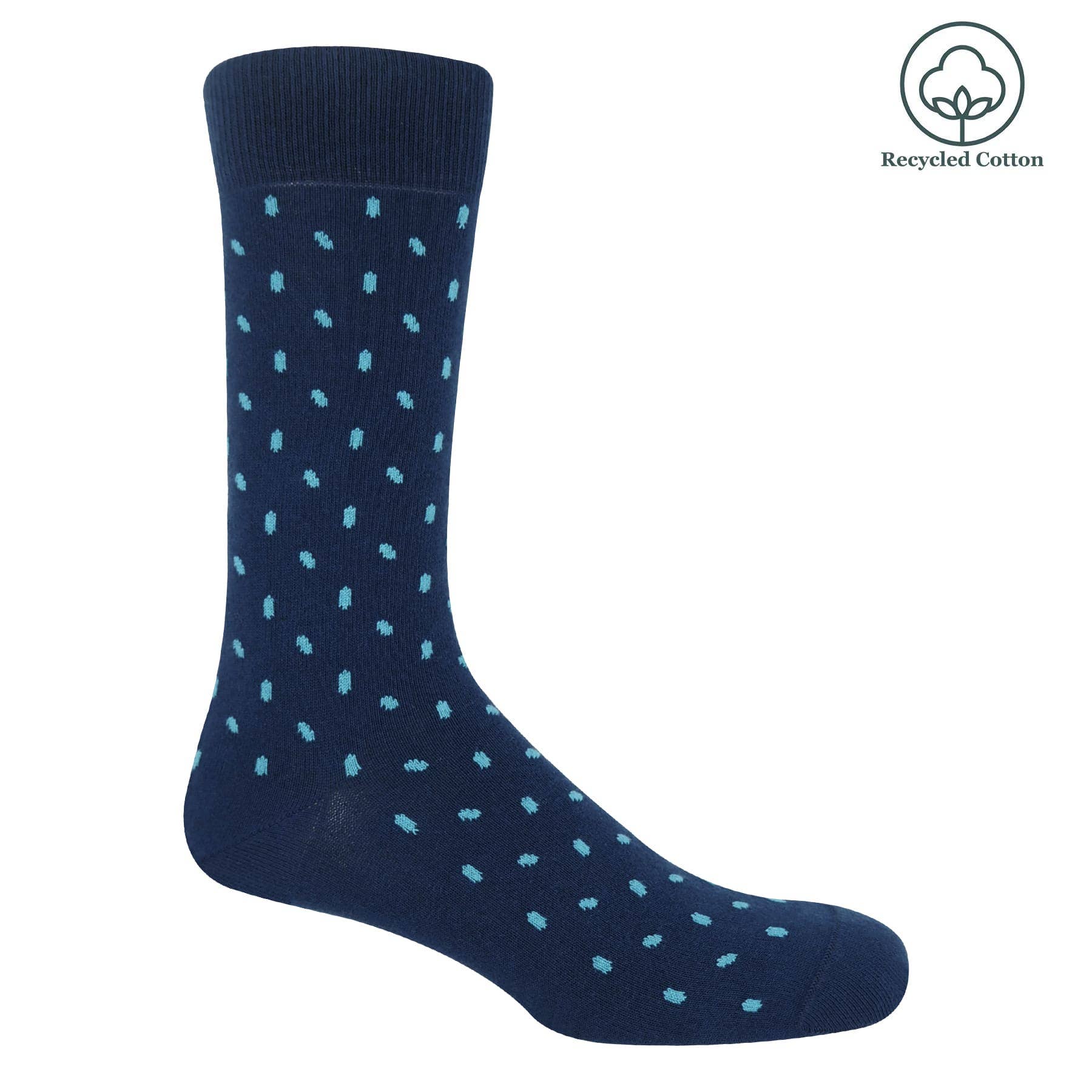 Navy sock with light blue dots on a white background, featuring a 'Recycled Cotton' label.
