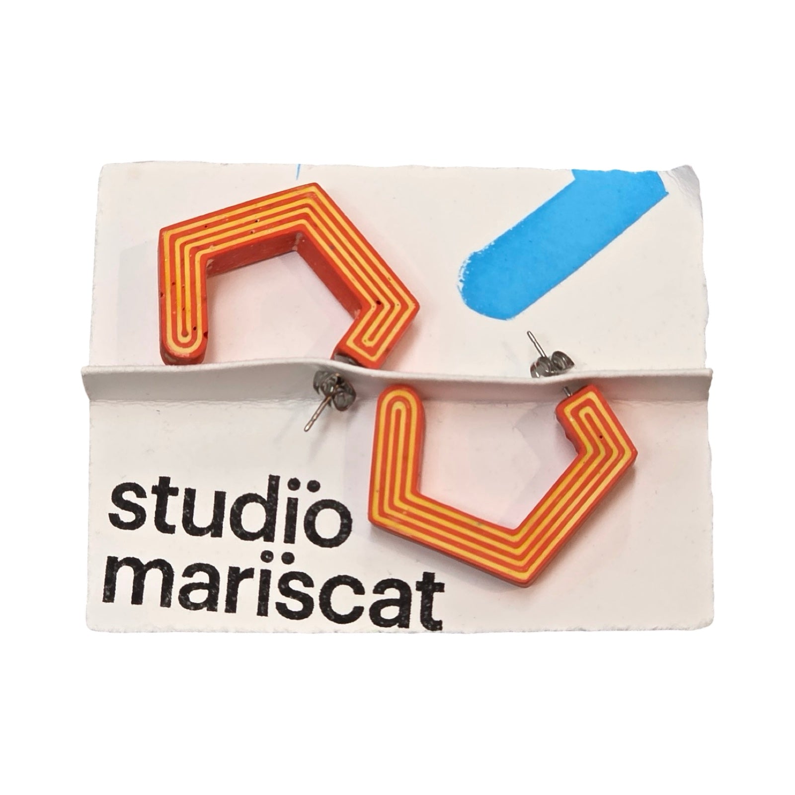 Orange chunky hexagon hoop earrings with yellow stripes.