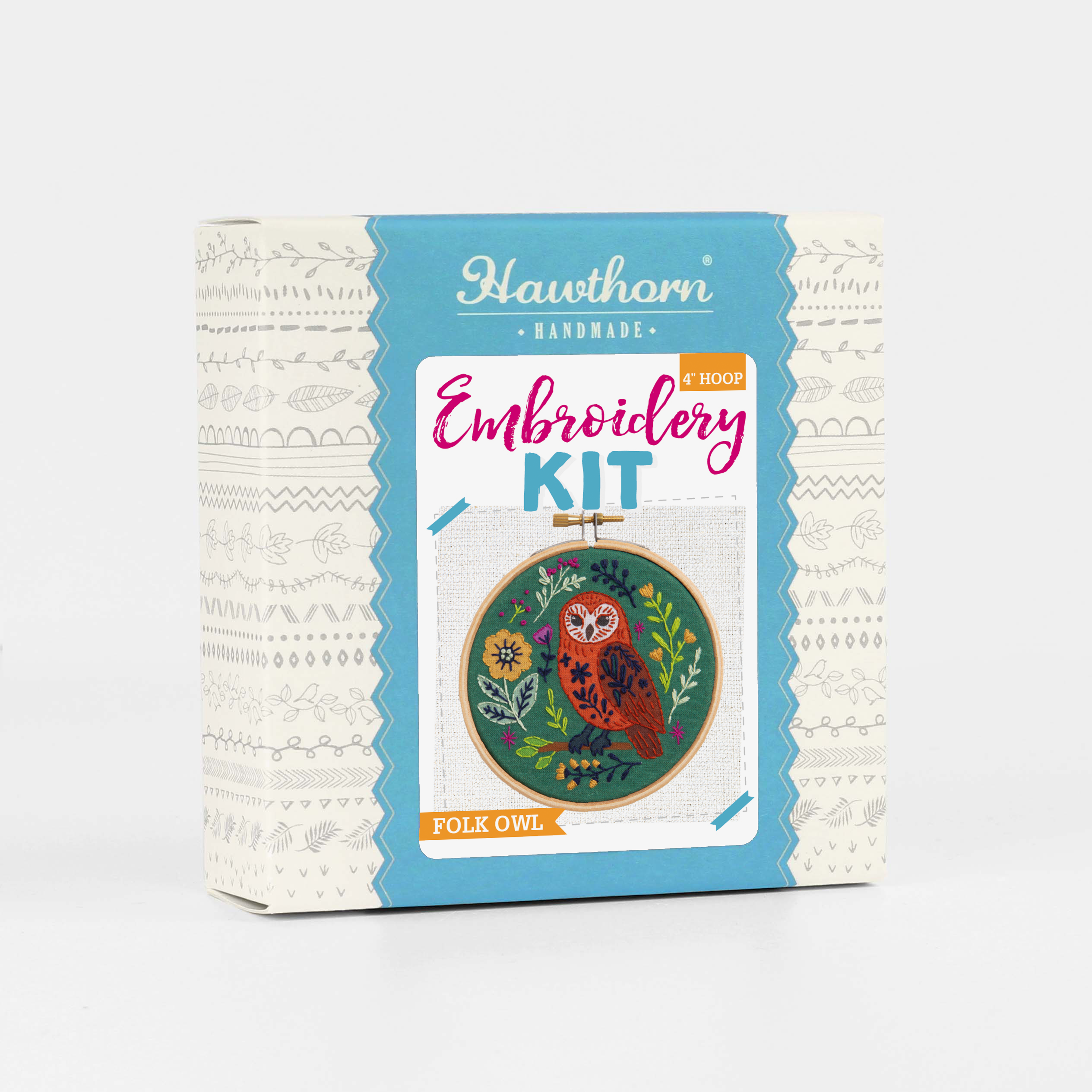 Embroidery kit packaging with owl design on a white background.