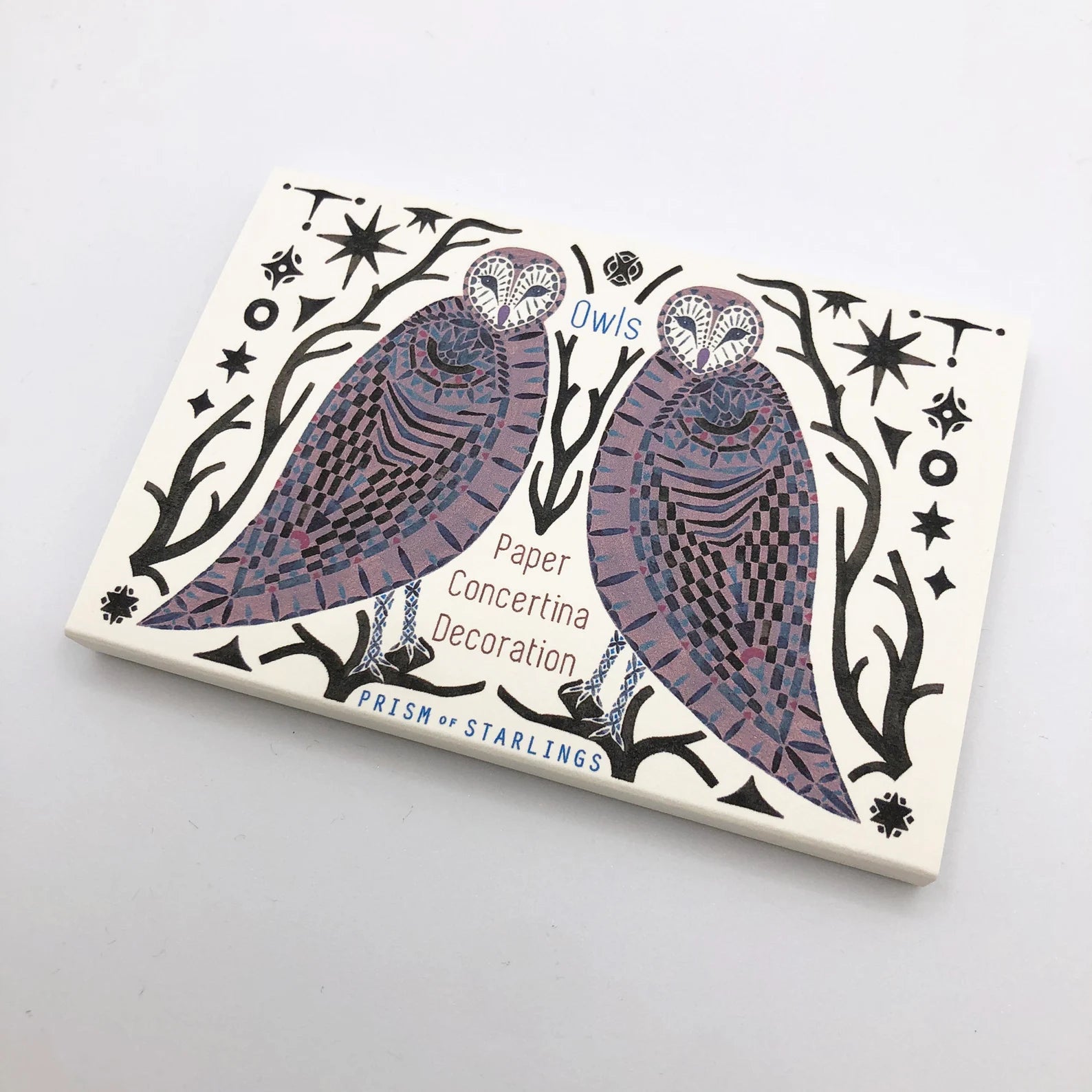 Card with owl design on a white background.