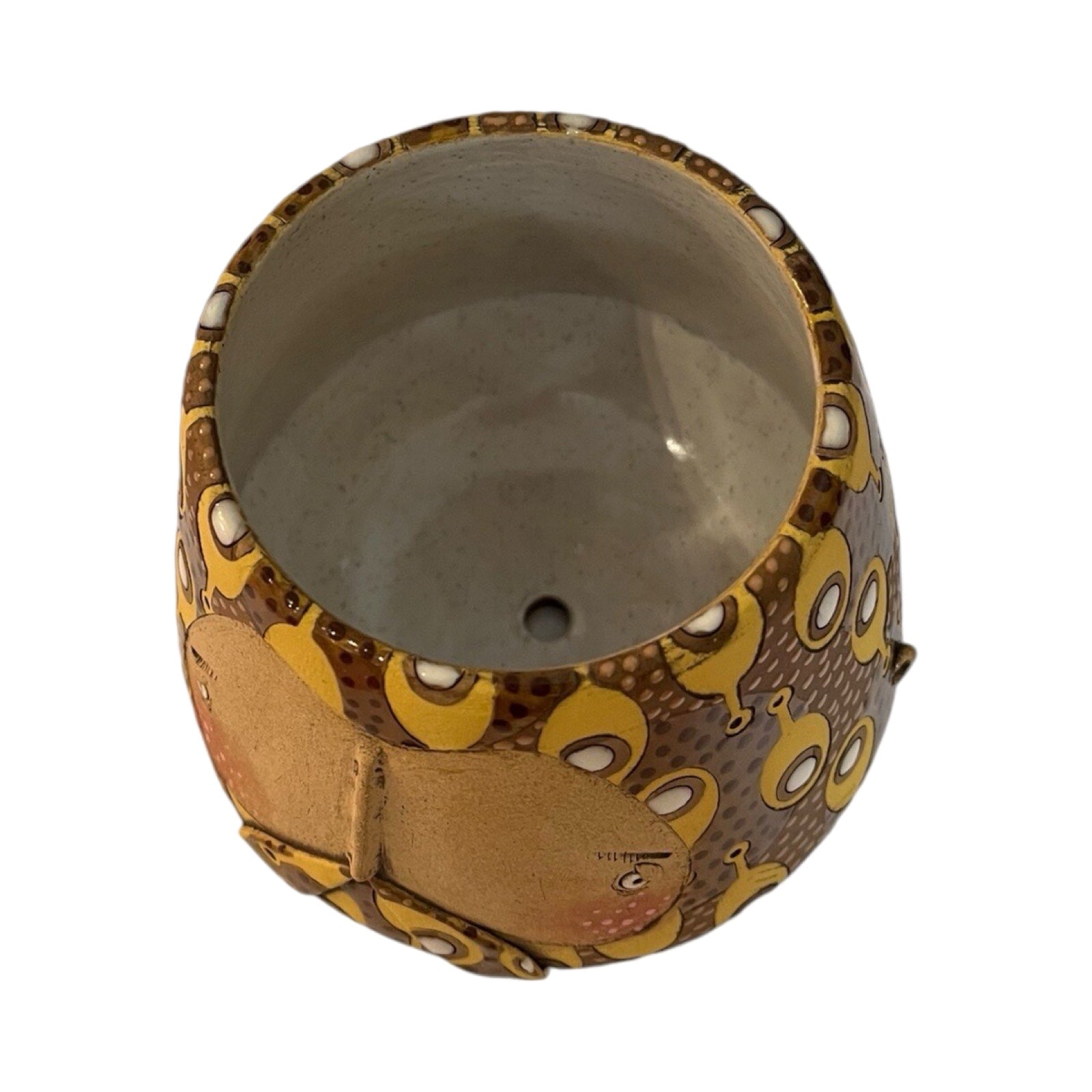 This beard-faced small plant pot is handmade and each one is truly unique, yellow and brown planter above.