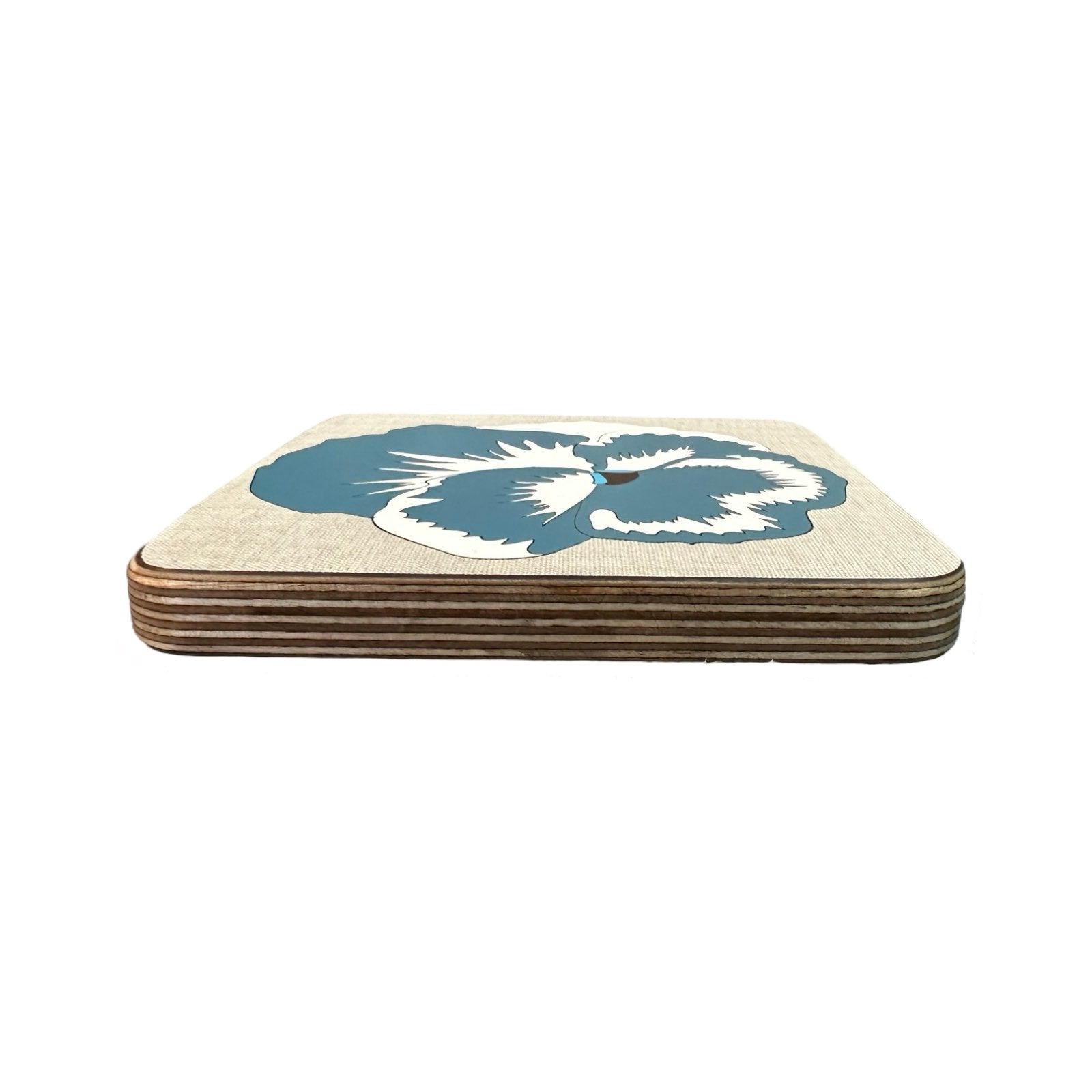 Handmade trivets are made from birch plywood with a colourful pansy flower design.