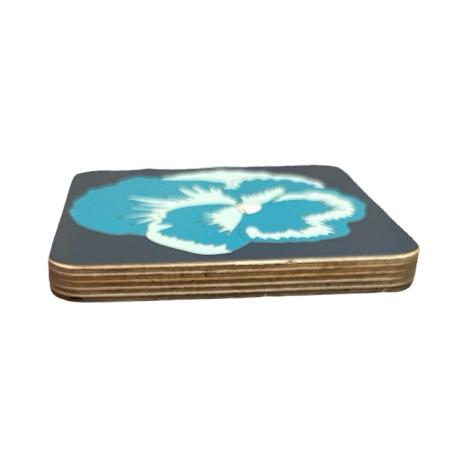 Handmade trivets are made from birch plywood with a colourful pansy flower design.