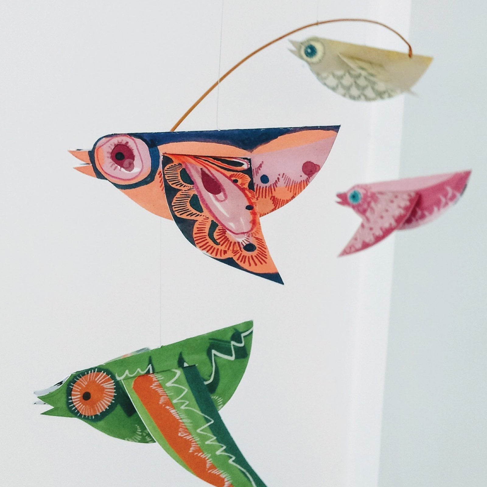 This beautiful paper birds mobile comes ready to hang, perfect for a nursery or any room with a little sunlight to create gorgeous shadows. 