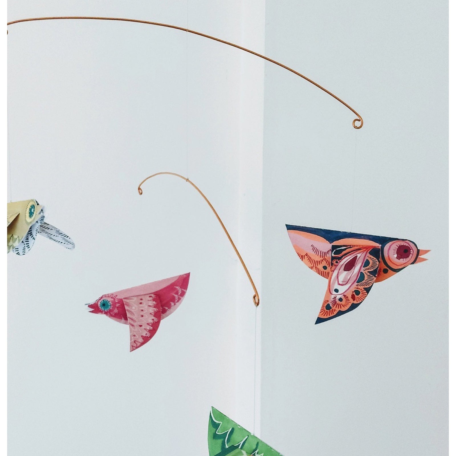 This beautiful paper birds mobile comes ready to hang, perfect for a nursery or any room with a little sunlight to create gorgeous shadows. 