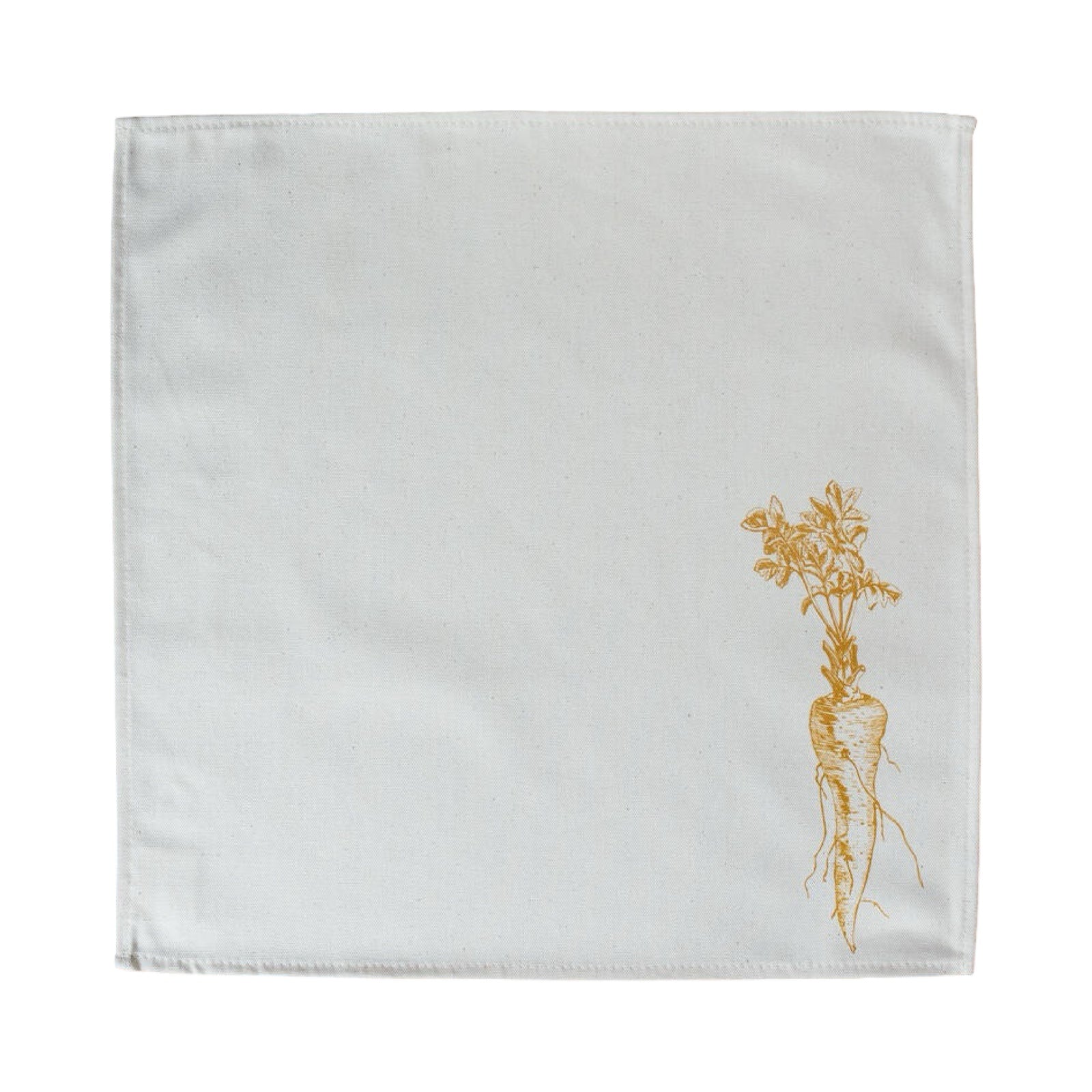 Cream cotton napkin with a mustard parsnip rolled on a plate.