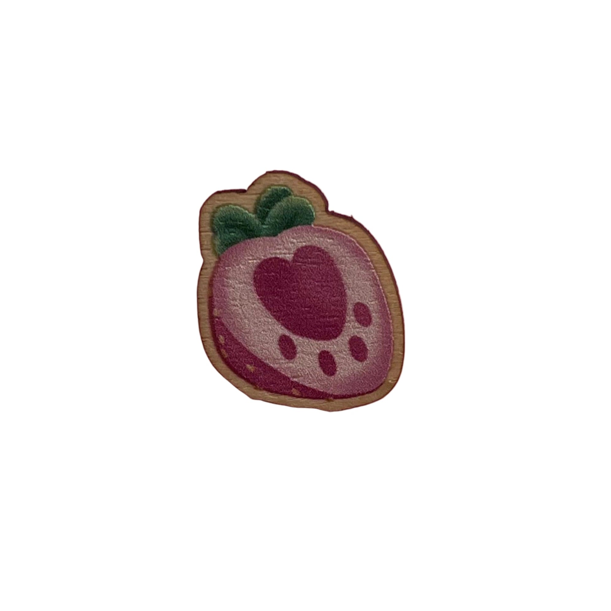 Mini wooden pin badge of a pink pawberry (heart-shaped strawberries with a paw shape inside). This badge is printed onto 3mm thick responsibly sourced European birch plywood.